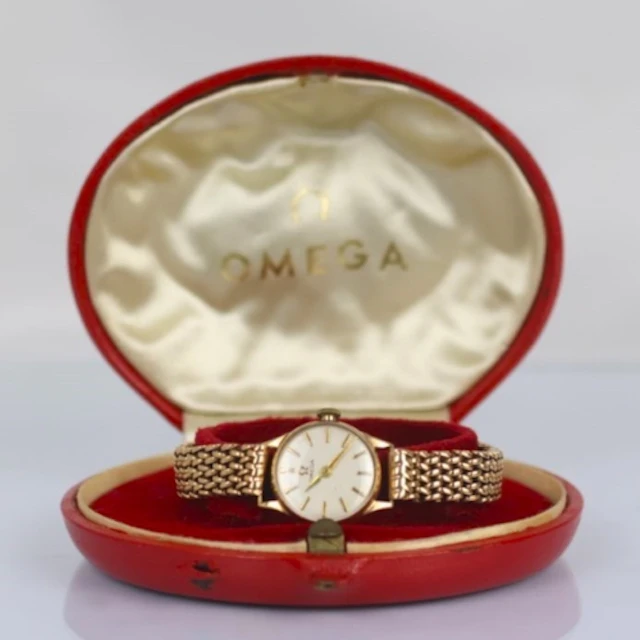 A late 20th century 9ct gold ladies Omega wristwatch, the ci...