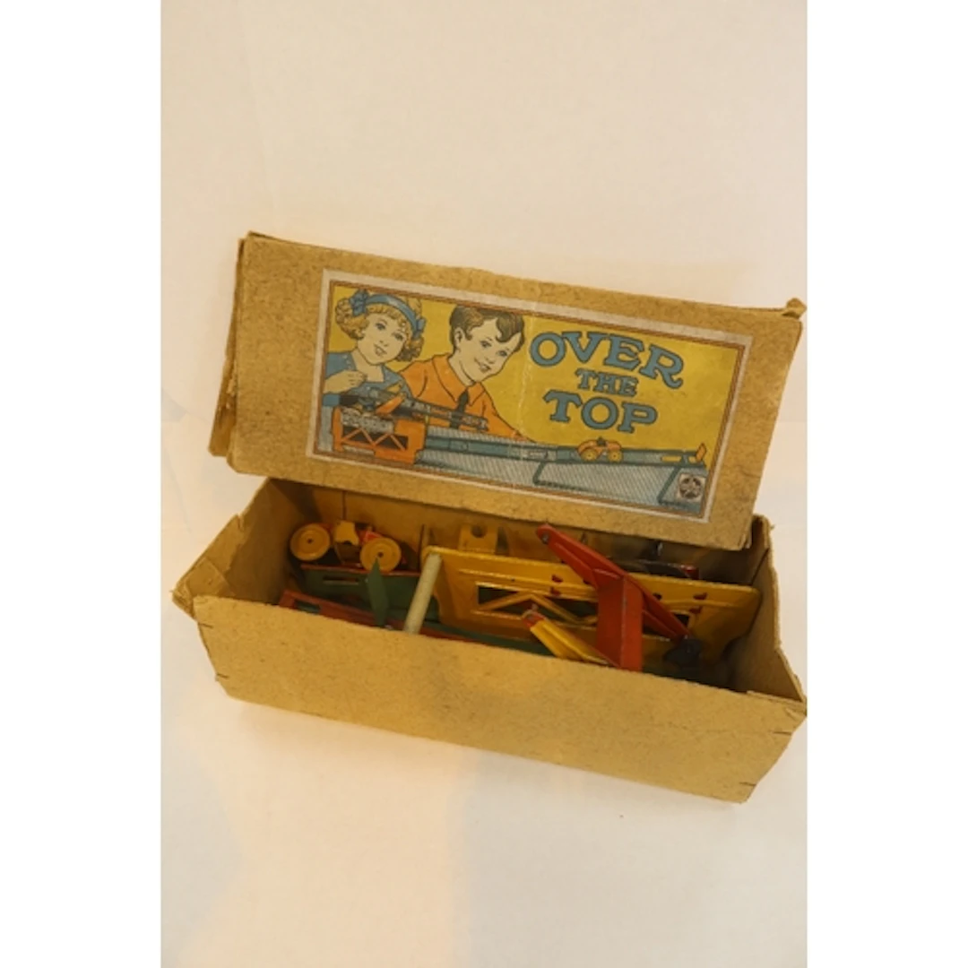 Over the Toy boxed clockwork car Track and Car