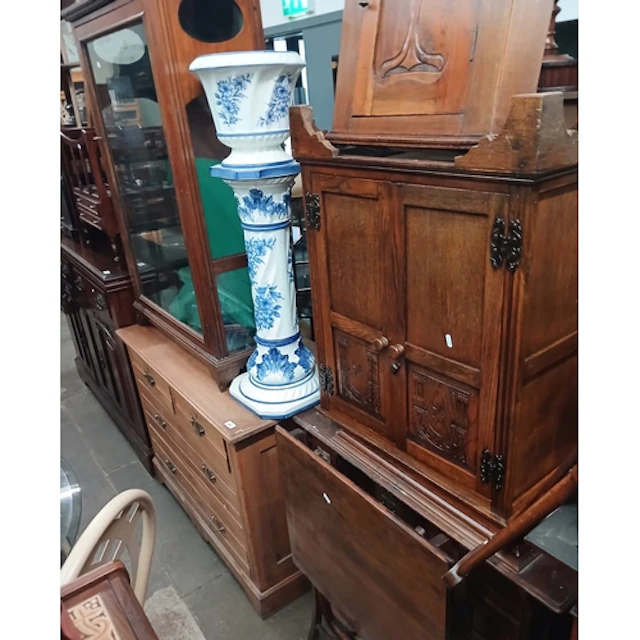 Assorted furniture comprising chest of drawers, glazed cabin...