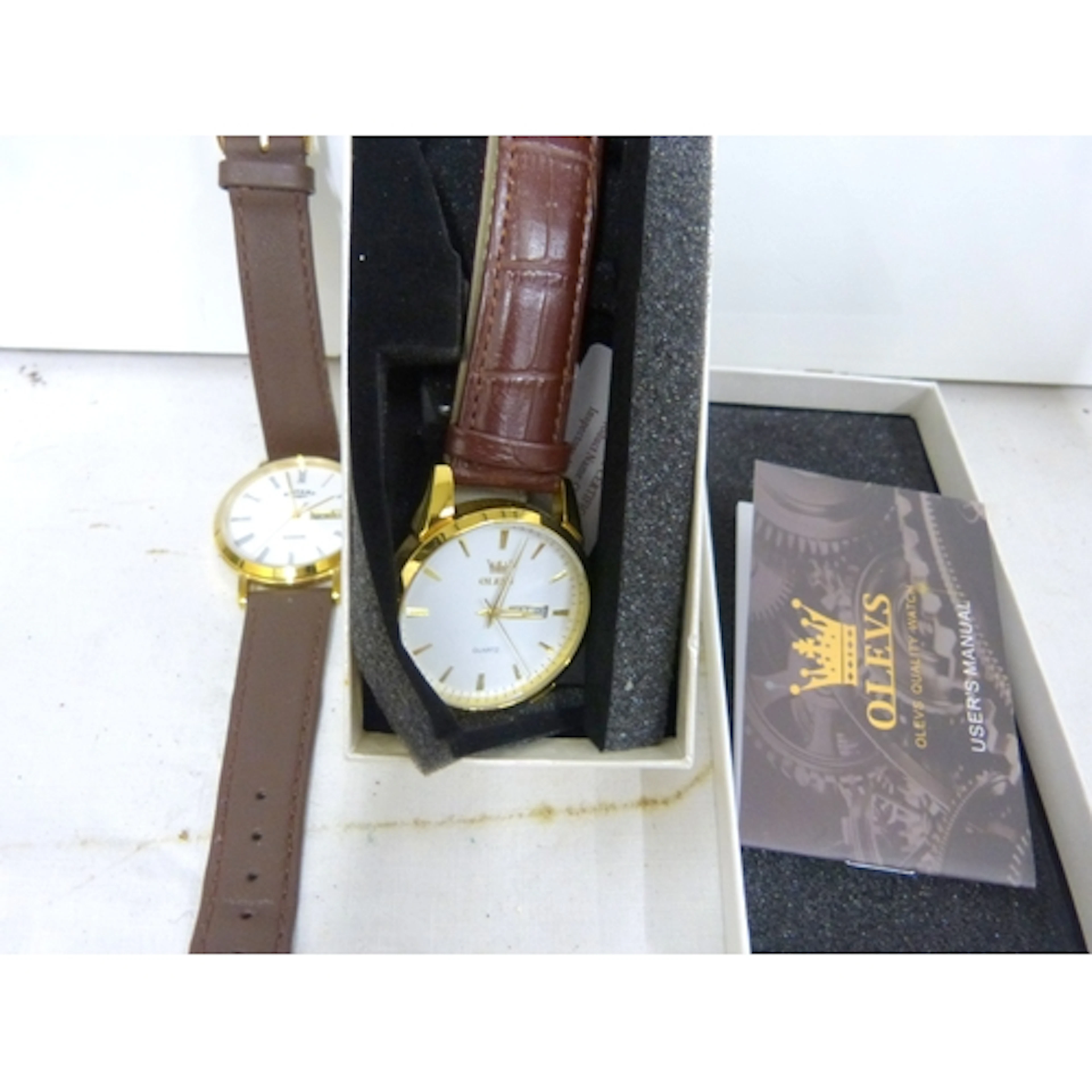 Rotary men's watch and Olevs boxed men's watch.