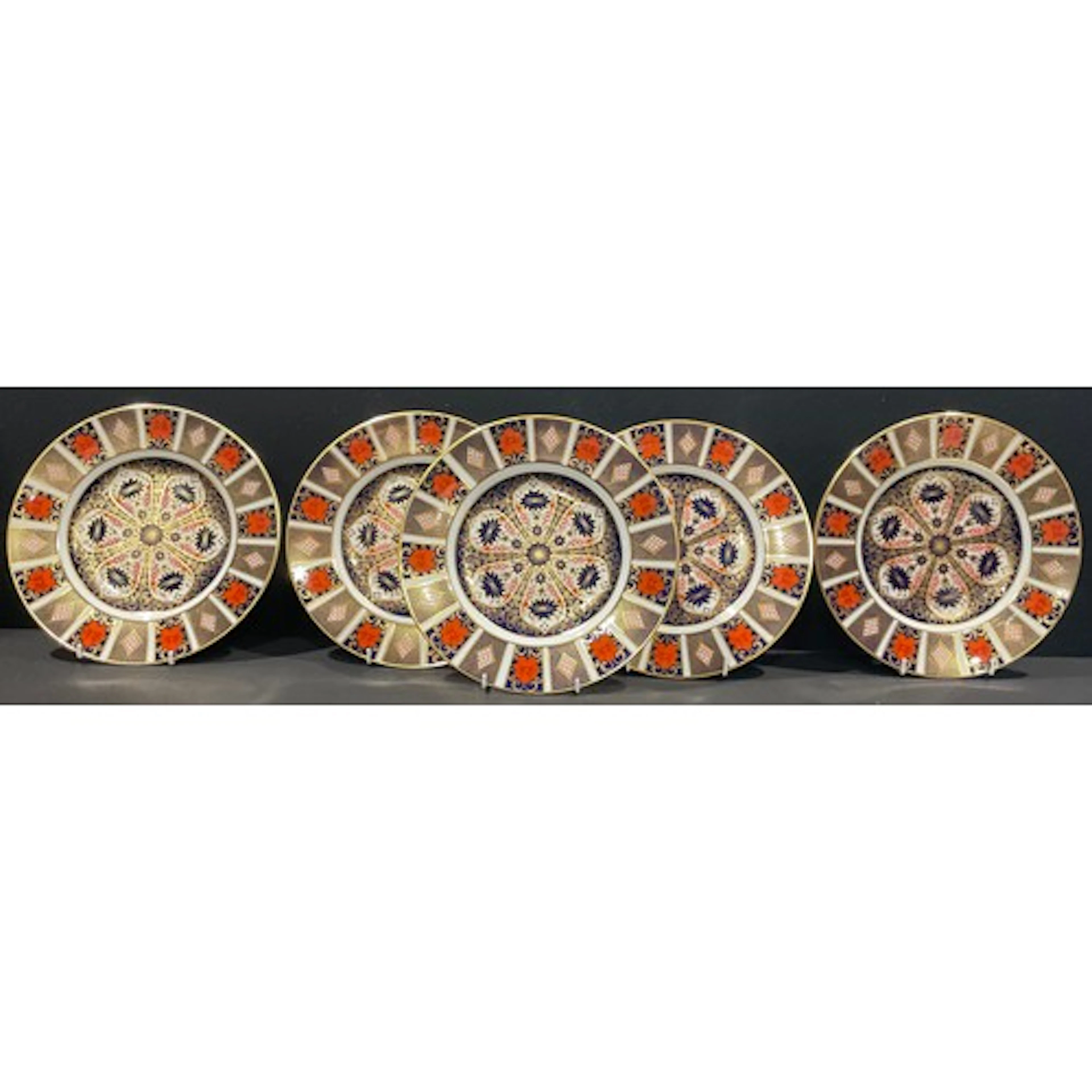 An associated set of five Royal Crown Derby Imari 1128 patte...