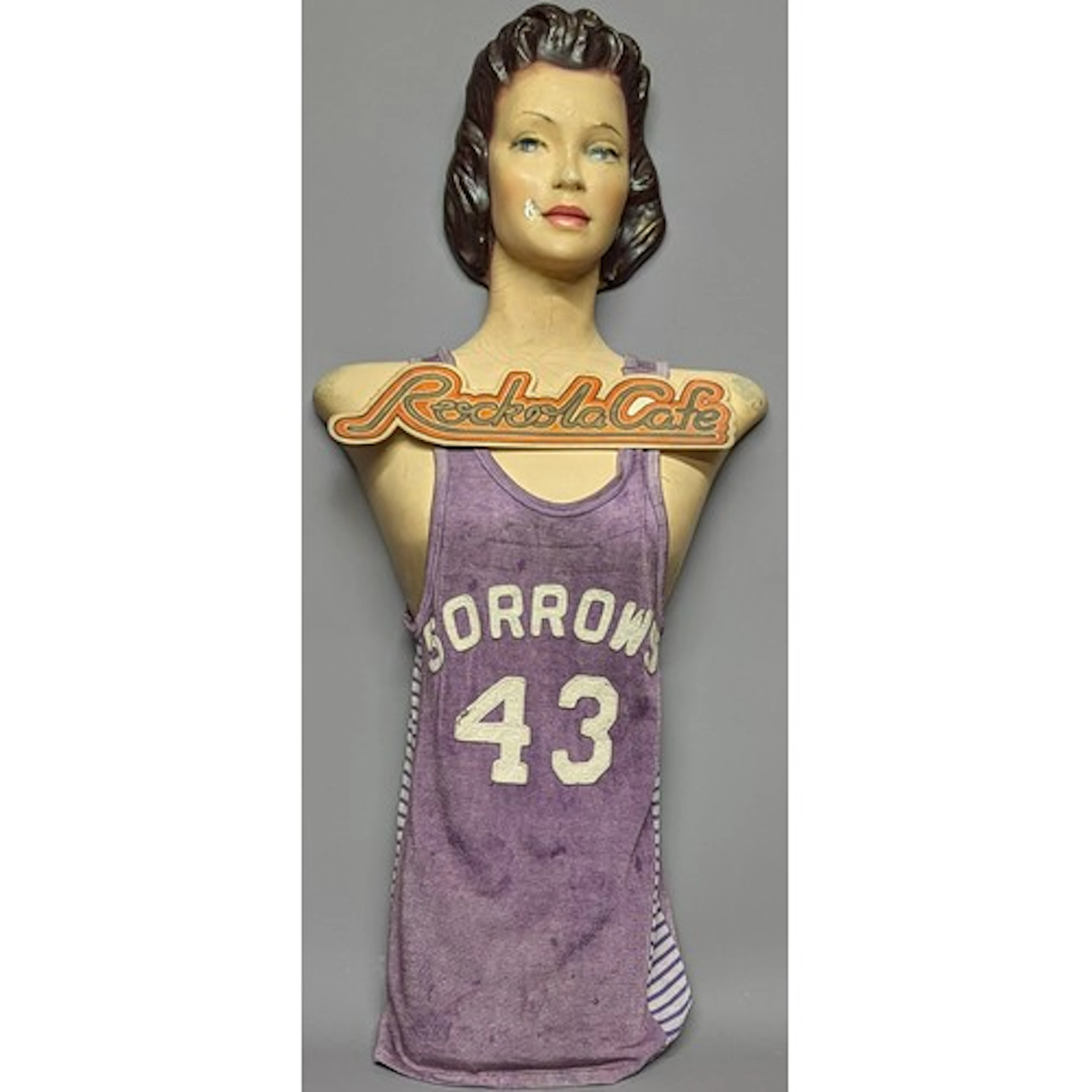 A 1930's/40's composite wall mannequin, female upper body, l...