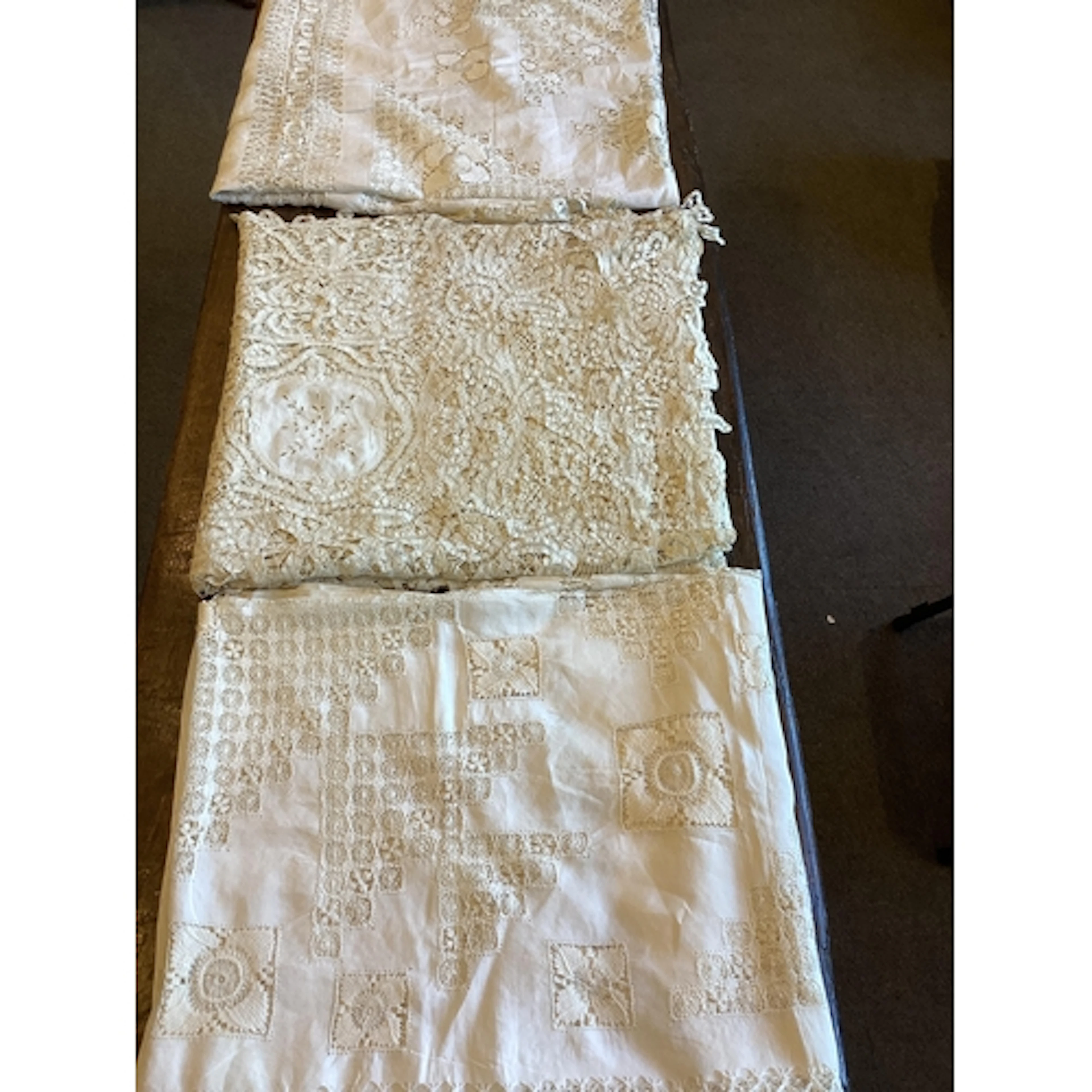 Two large drawn thread linen tablecloths and an ornate Cluny...