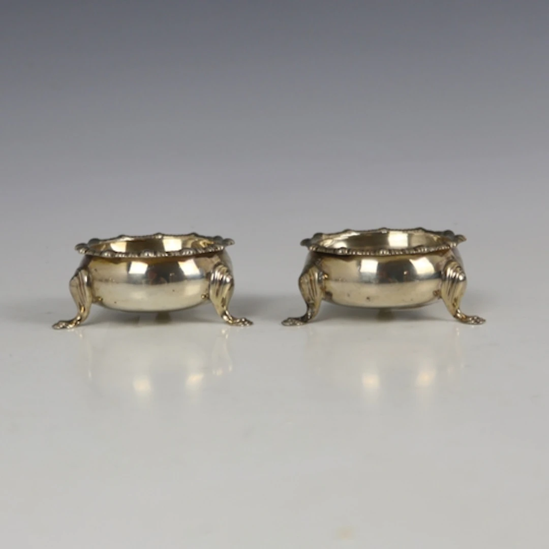 A pair of Edwardian silver open salts, Goldsmiths & Silversm...