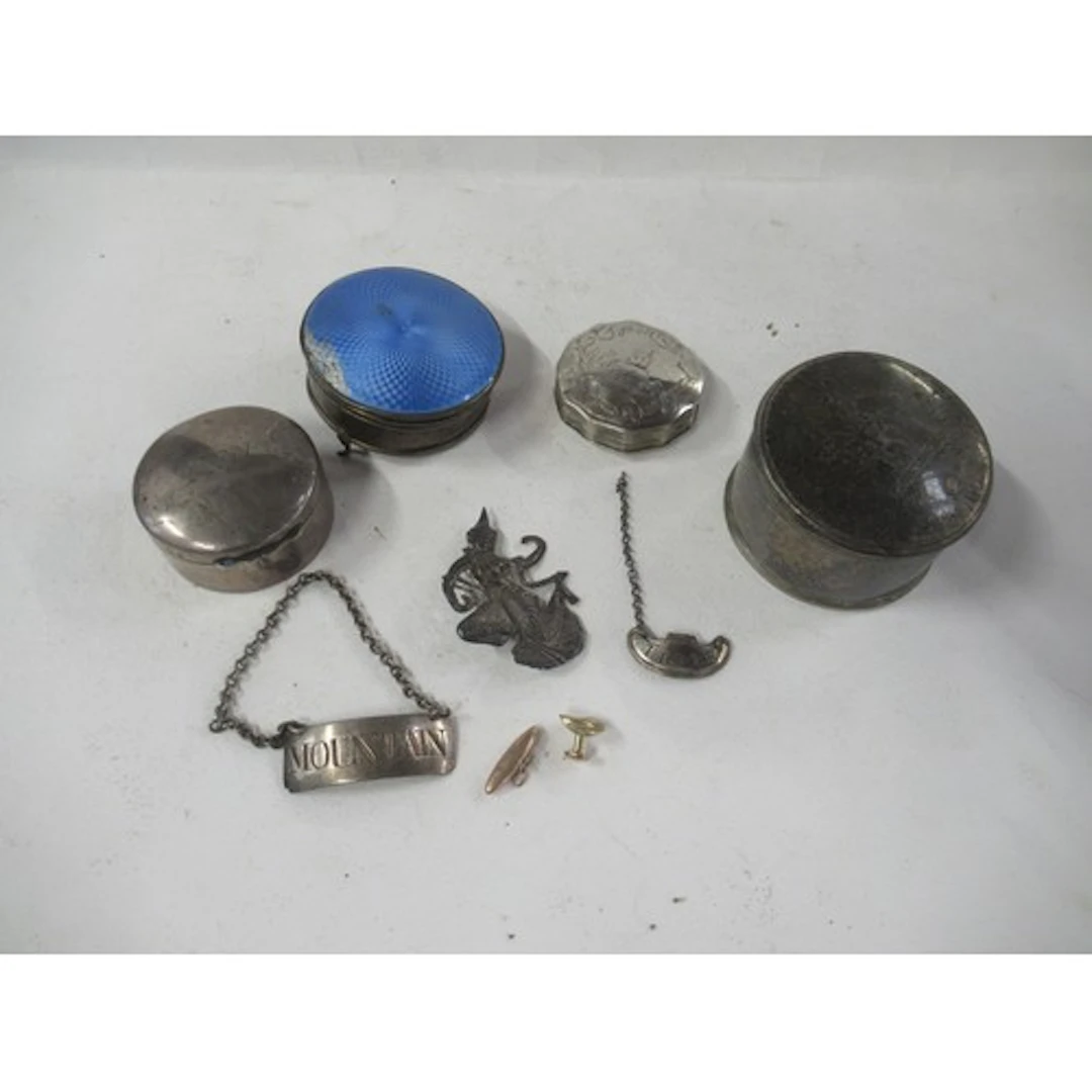 Four silver and silver coloured trinket boxes, together with...