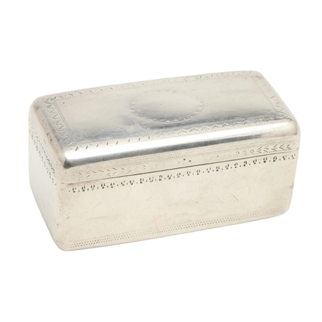 A GEORGE III SILVER SNUFF BOX. Of rectangular form, with eng...