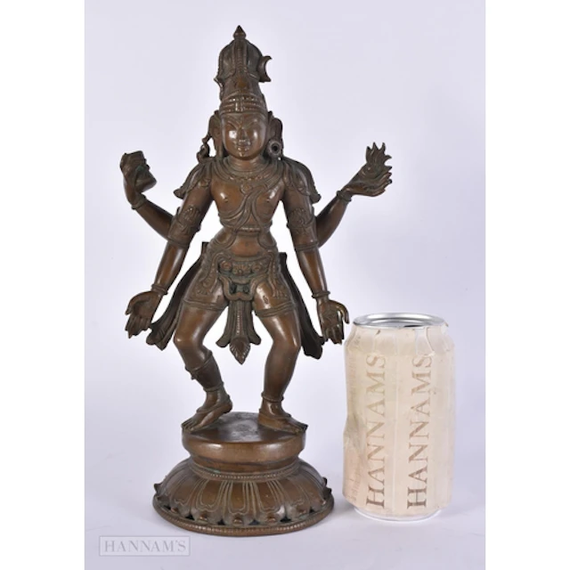 A 19TH CENTURY INDIAN BRONZE FIGURE OF VISHNU modelled in th...