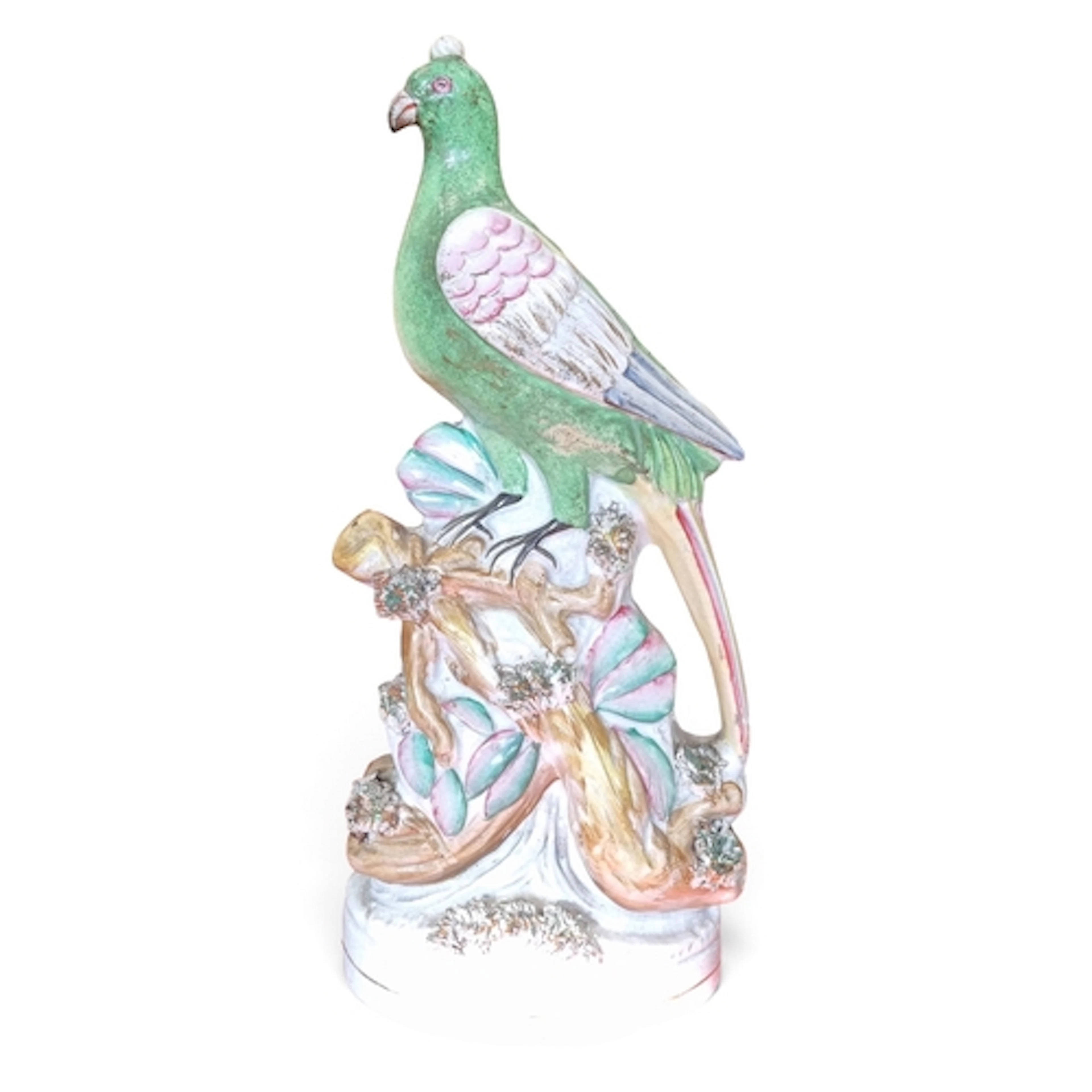 An early 19th Century Staffordshire Figure of an exotic bird...