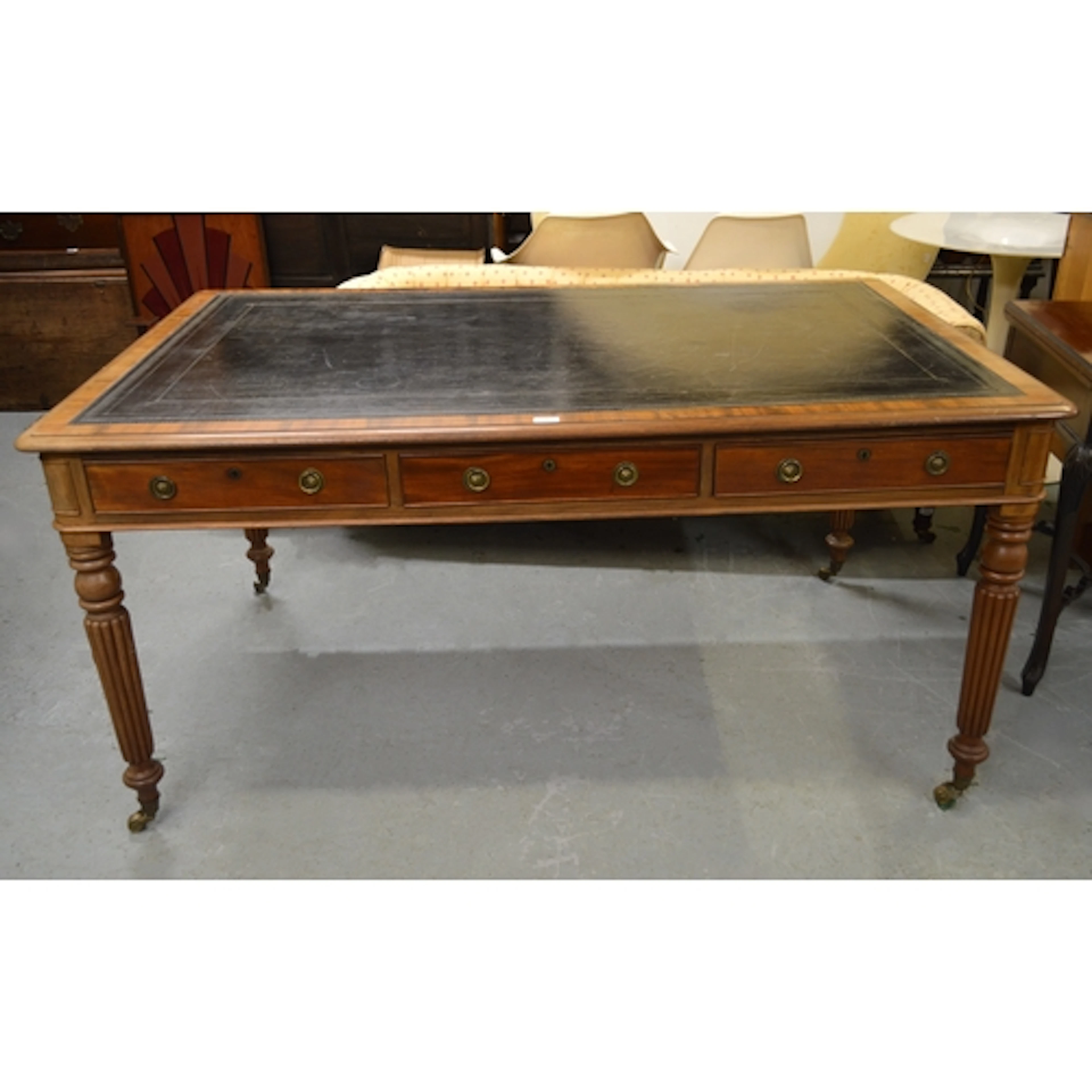Late 19th / early 20th Century mahogany library table, the l...