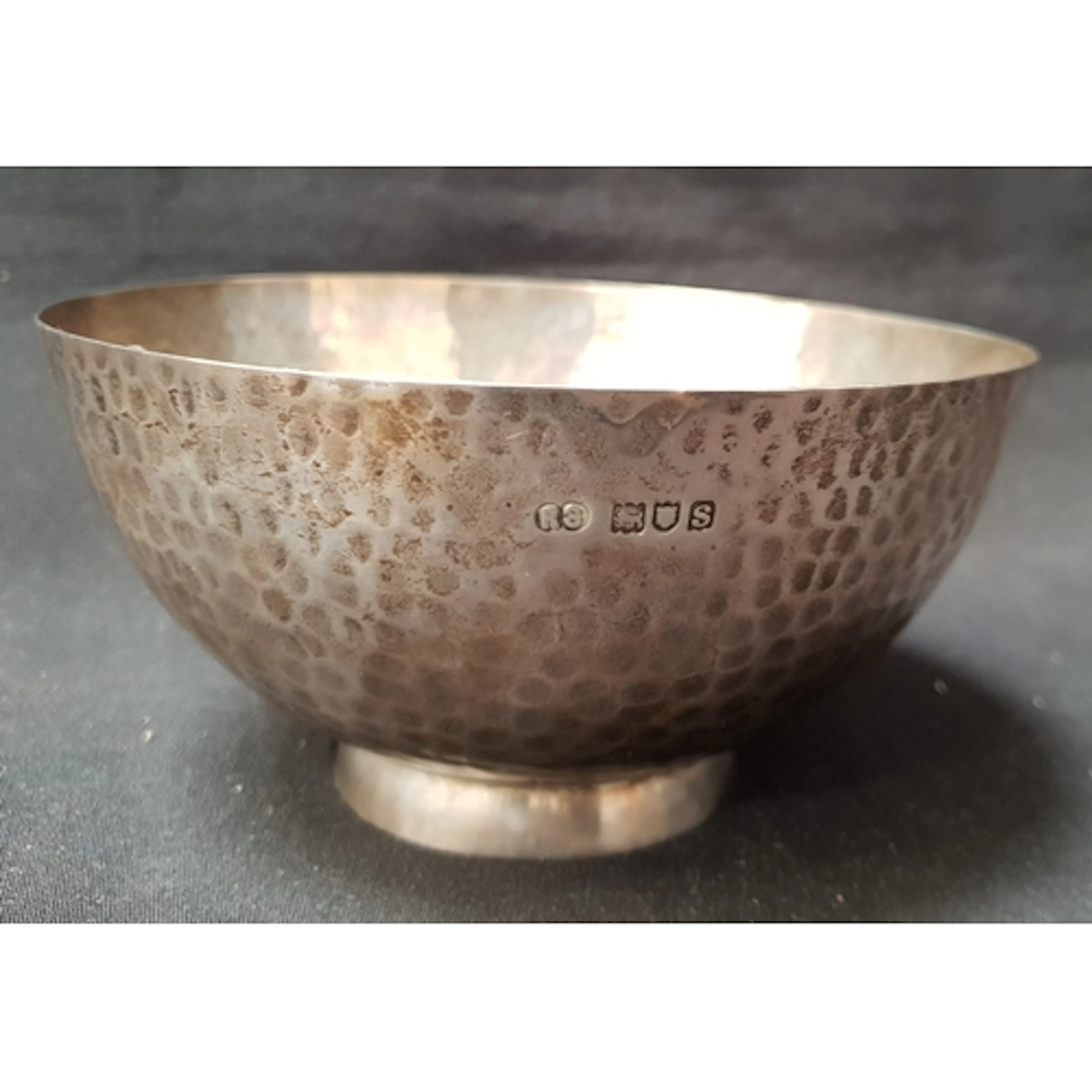 EARLY 20th CENTURY SILVER BOWL with hammered decoration, wit...