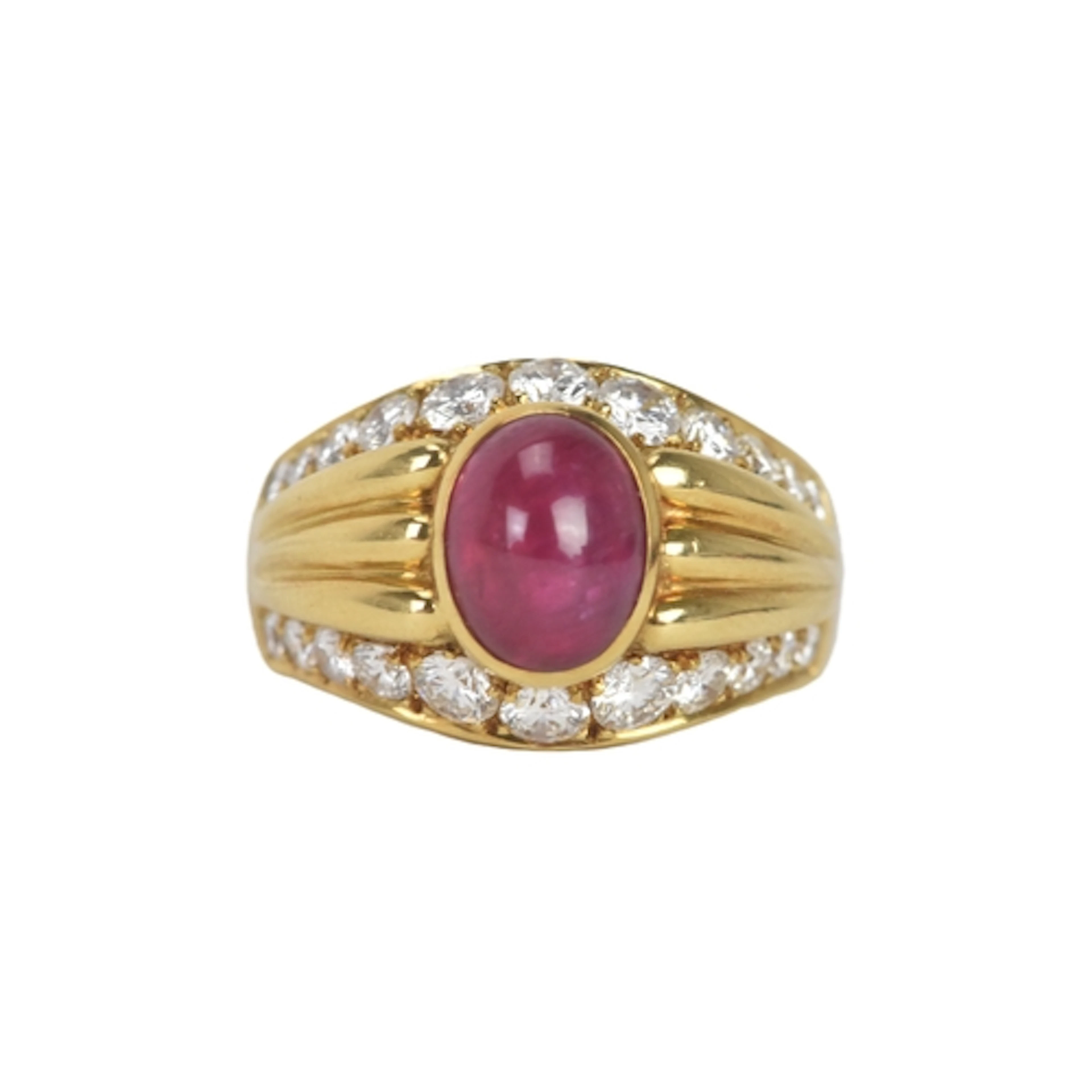 A Bulgari 18ct gold, ruby and diamond dress ring, centred by...