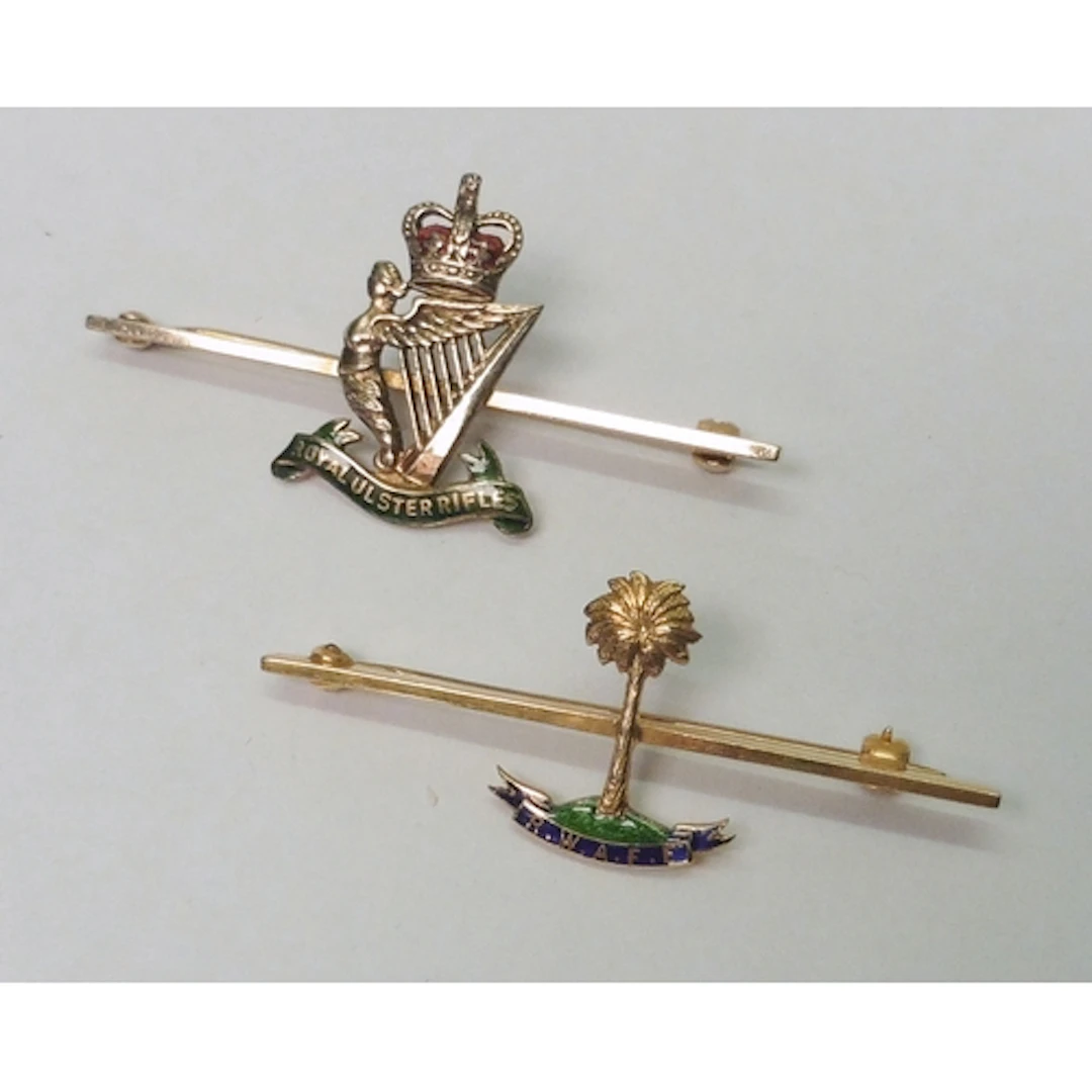 Two Cold War era 9ct gold sweetheart bar brooches, one West ...