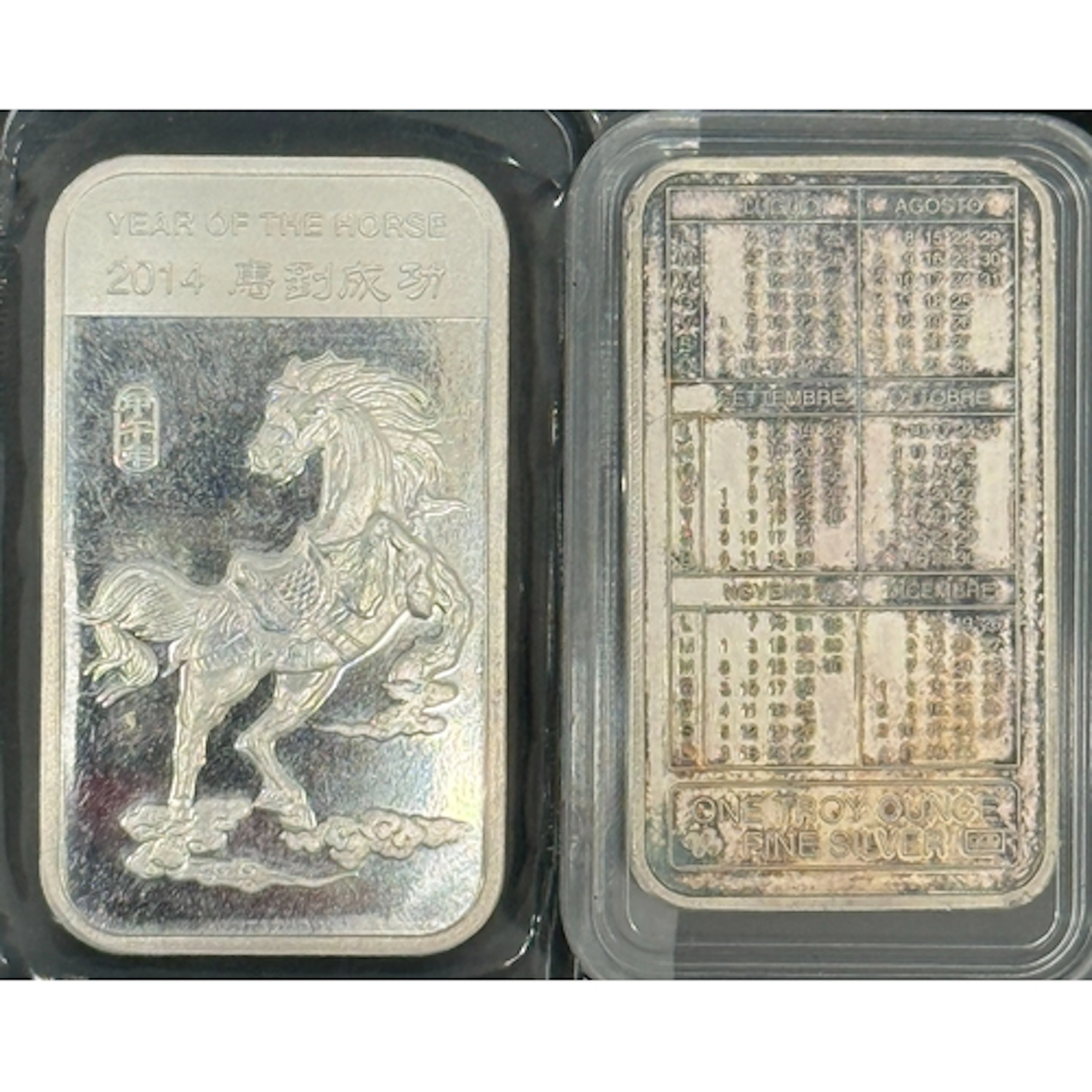 A pair of 1oz .999 fine silver ingots, comprising a 1994 Cal...