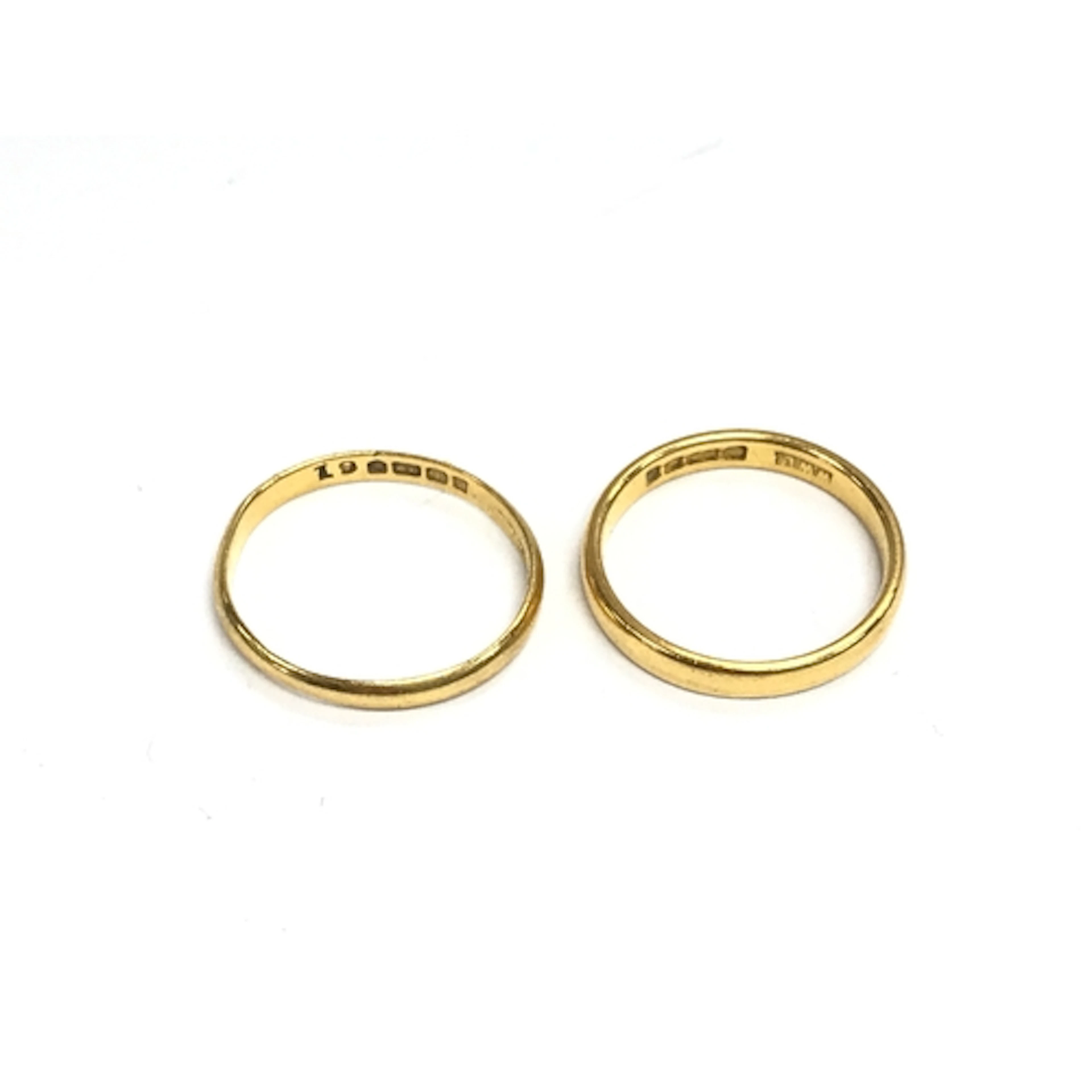 Two 22ct gold wedding bands. 4g