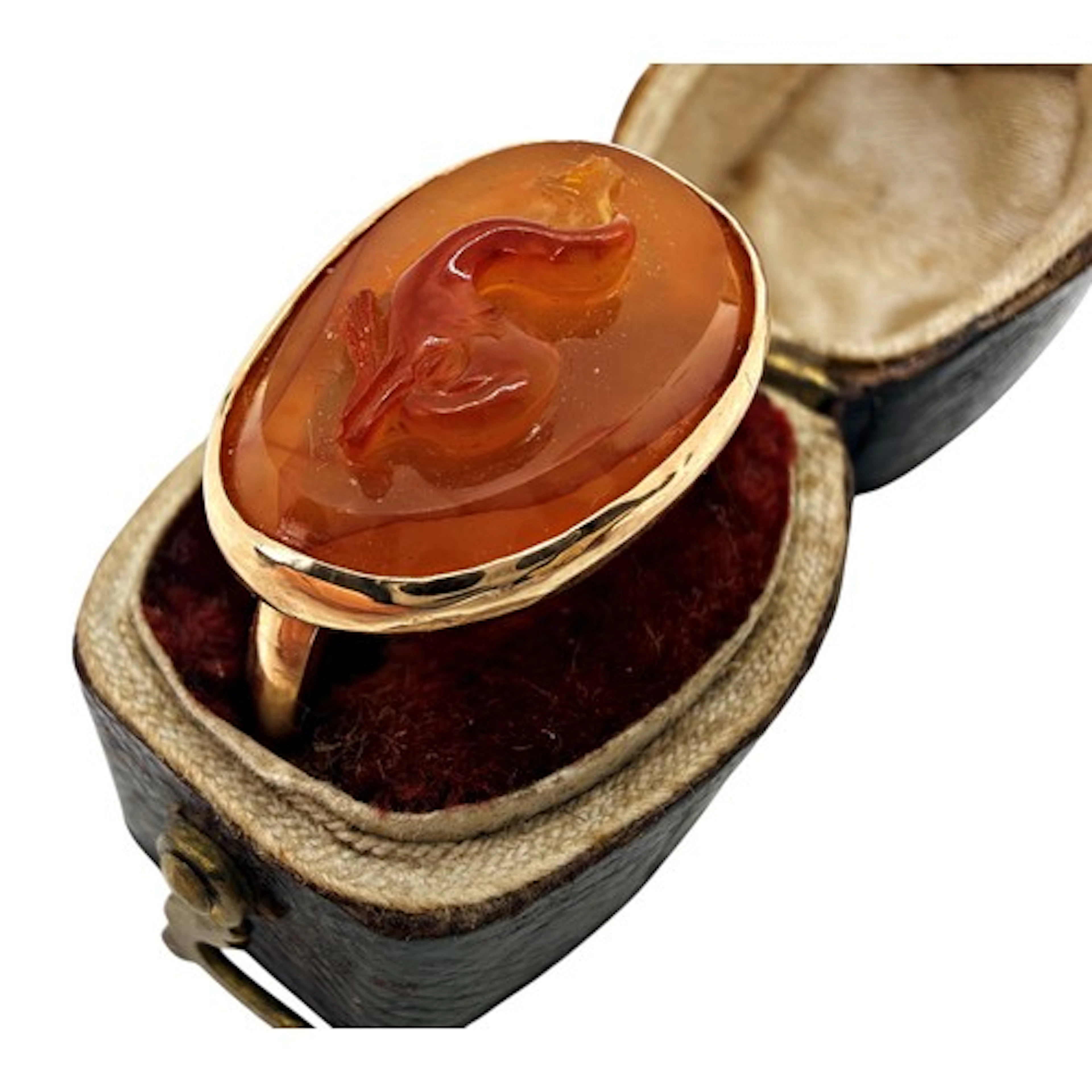 A high carat gold ring set with an Italian Renaissance carne...