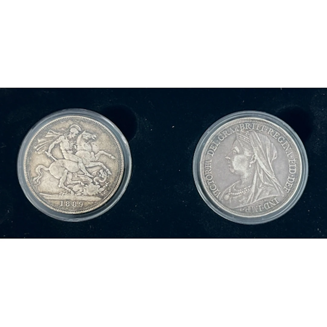 A pair of UK QV silver crowns for 1889 and 1897, condtion go...