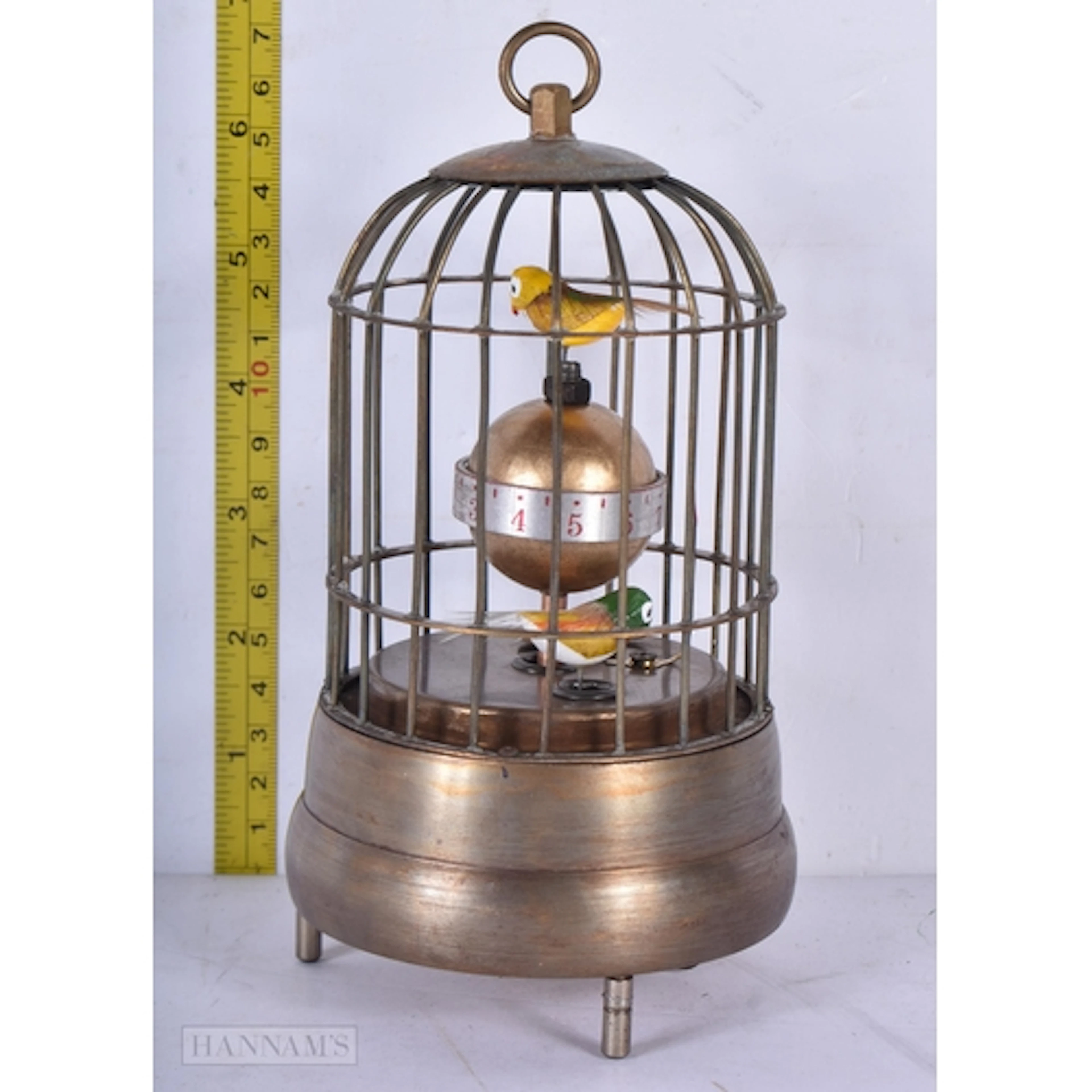 A small brass birdcage clock 17cm