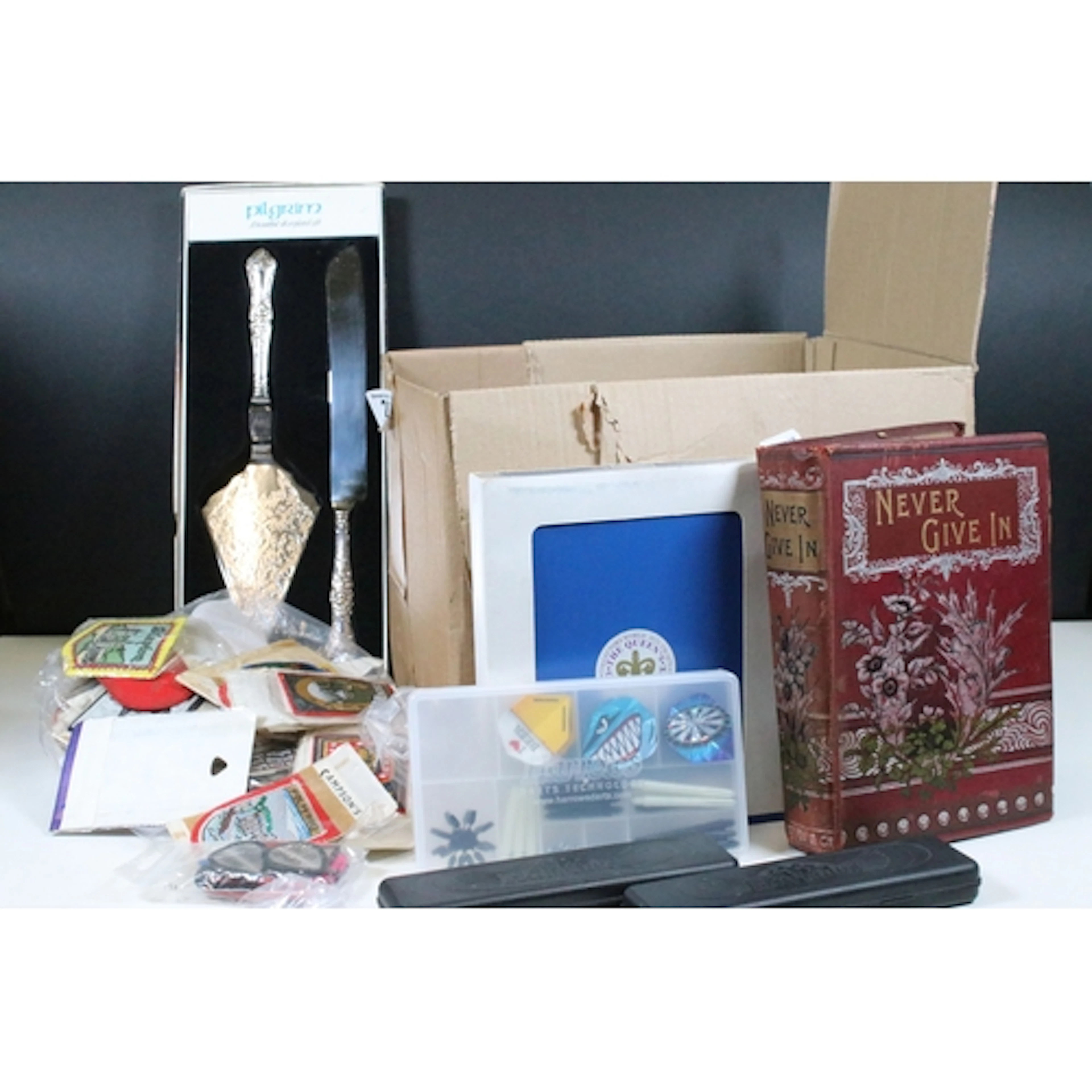 A group of mixed collectables to include badges, coins, orna...