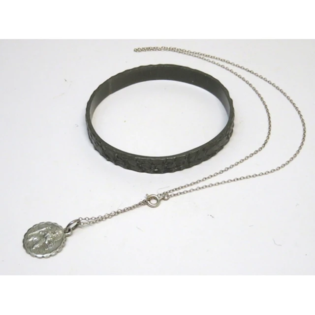 Georg Jensen pewter bangle, number 217, and a silver St Chri...