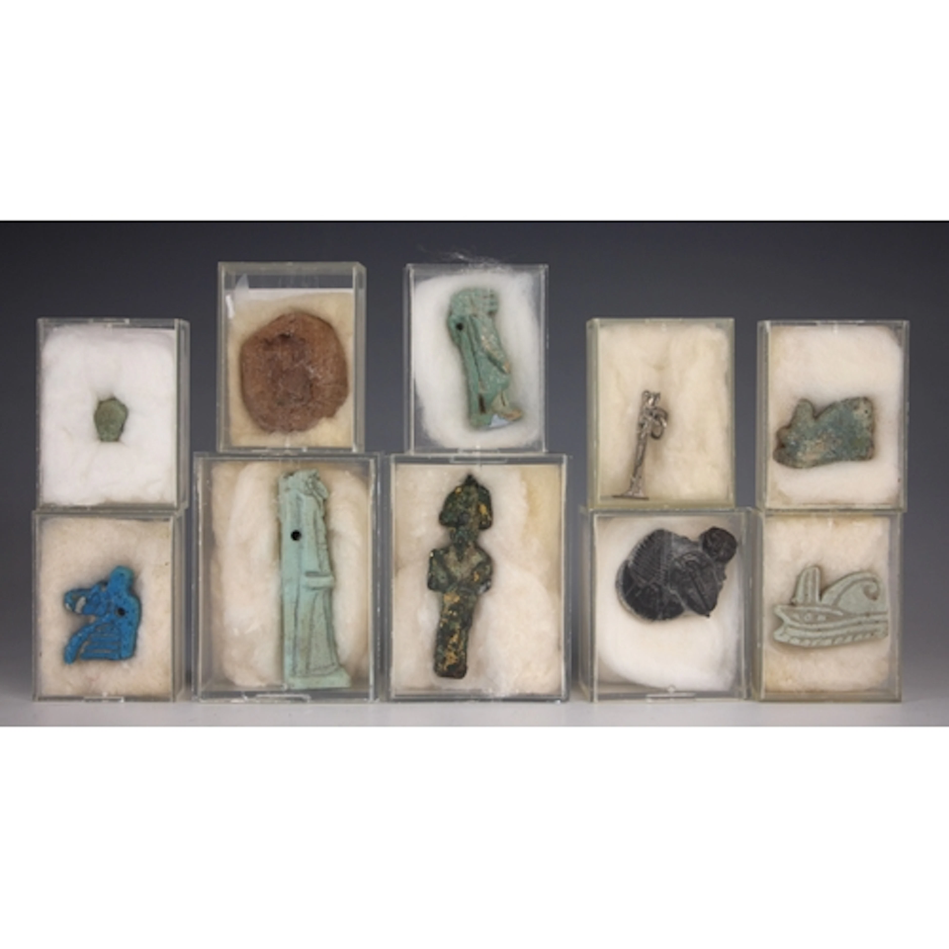 A selection of Egyptian antiquities, to include a votive off...