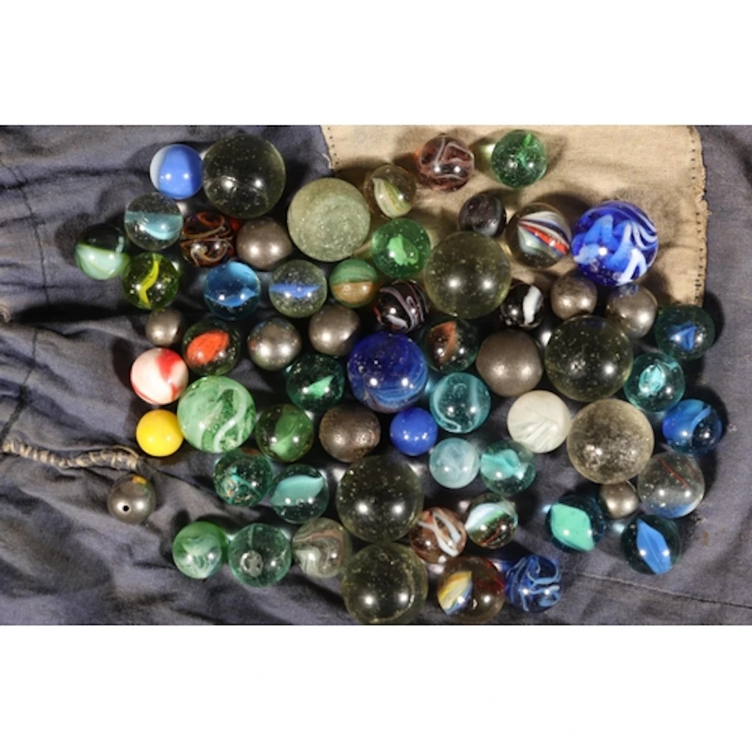 Vintage bag containing marbles.
