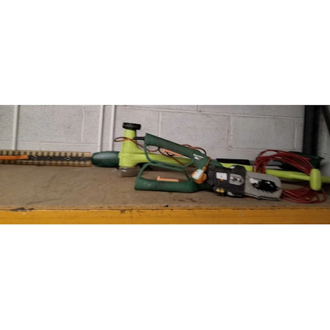 A COLLECTION OF GARDEN POWER TOOLS including a Black and Dec...
