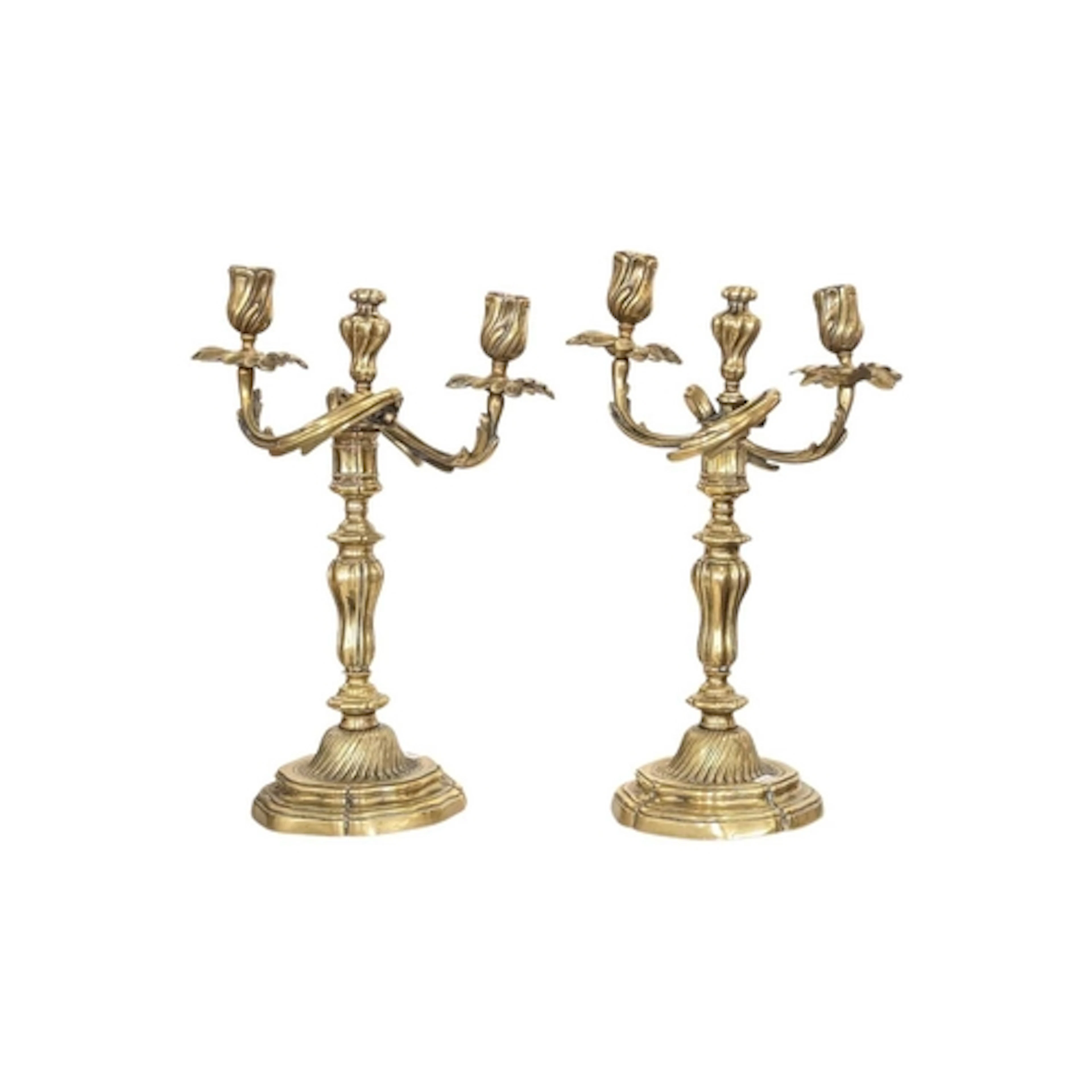 Pair of 19th century French Empire brass candlesticks. With ...