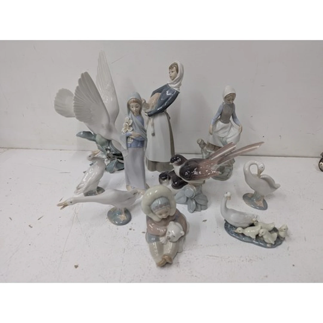 Lladro figurines to include a lady with a lamb no: 4584, Esk...