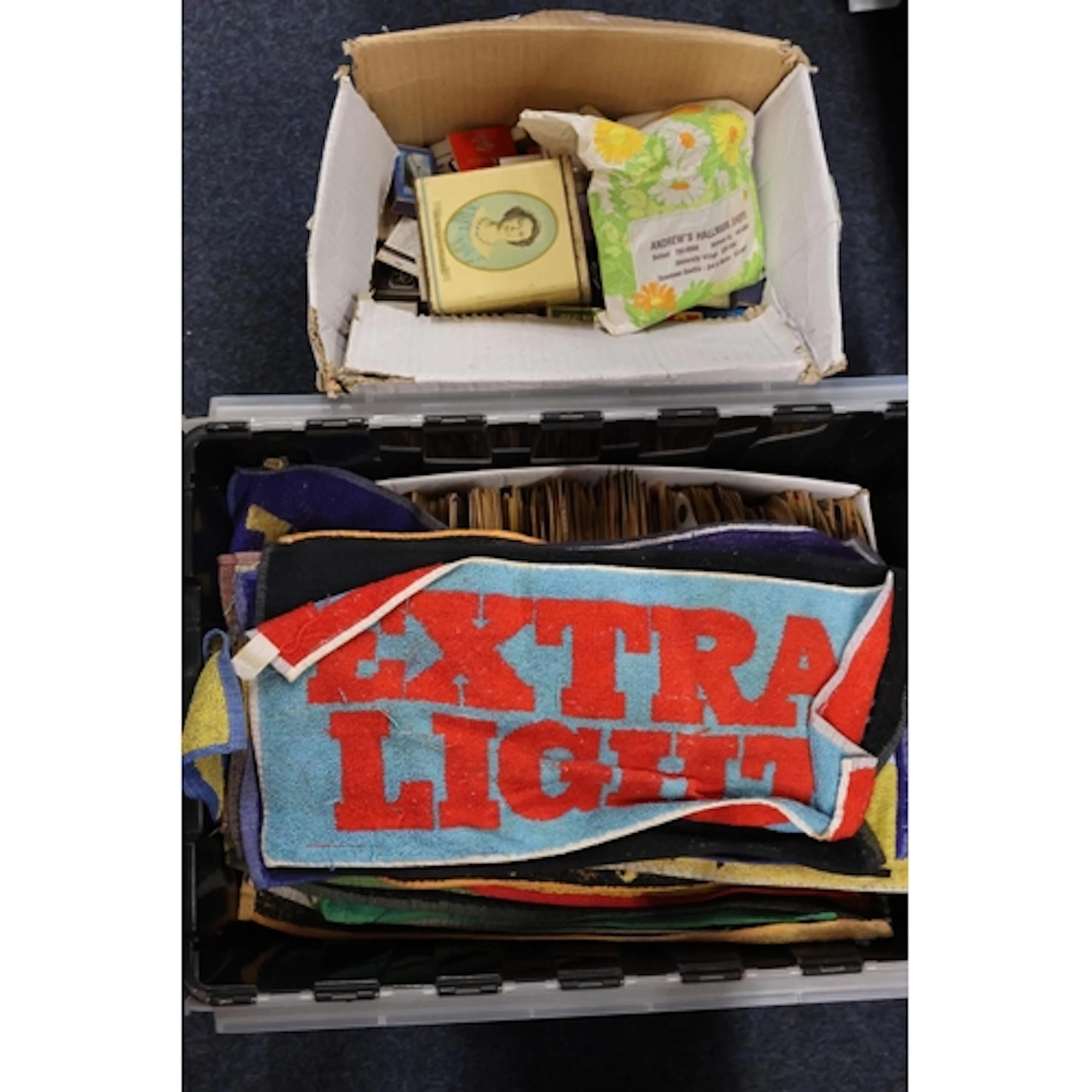 Two boxes containing pub memorabilia to include beer mats, t...