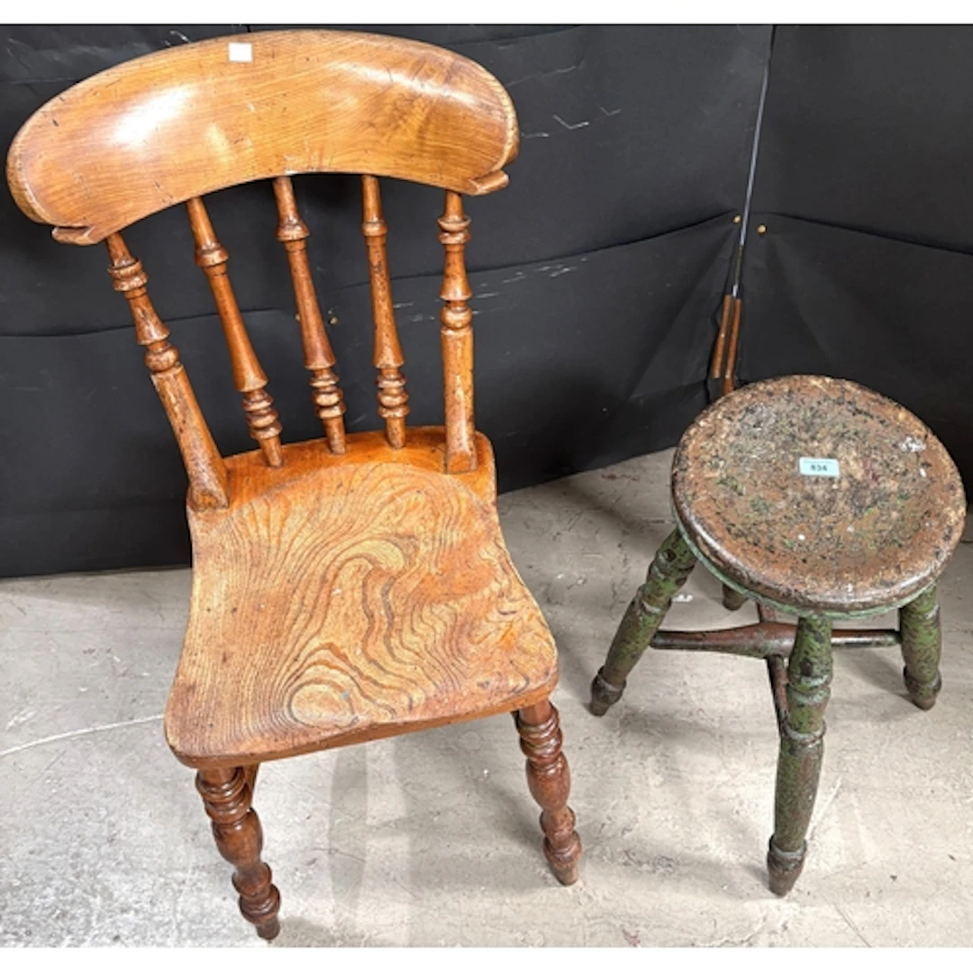 A distressed look 19th century milking stool with an elm sea...