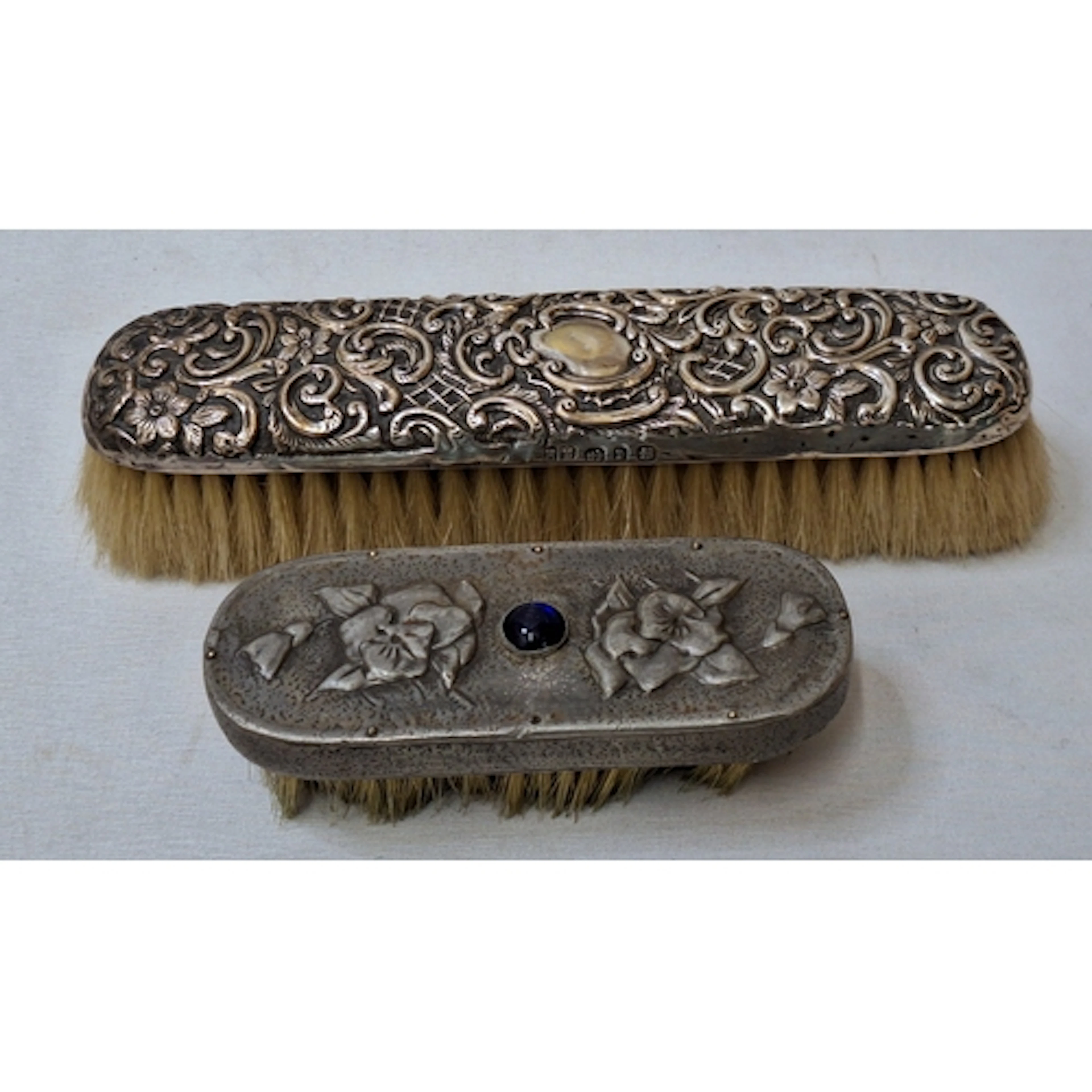 2 Antique Clothes Brushes, larger ornate hallmarked silver t...