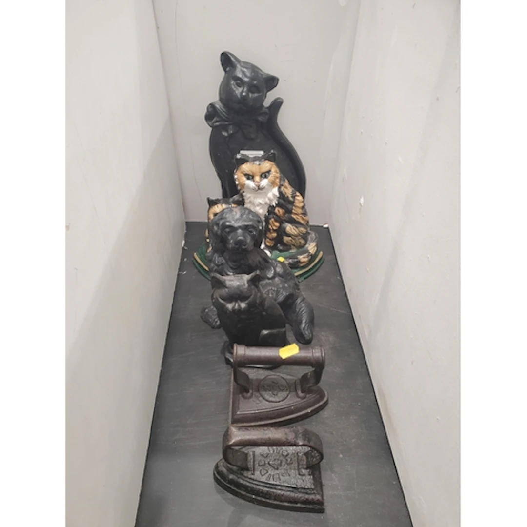 Three cast iron cat Doorstops, a dog Doorstops and two Flat ...