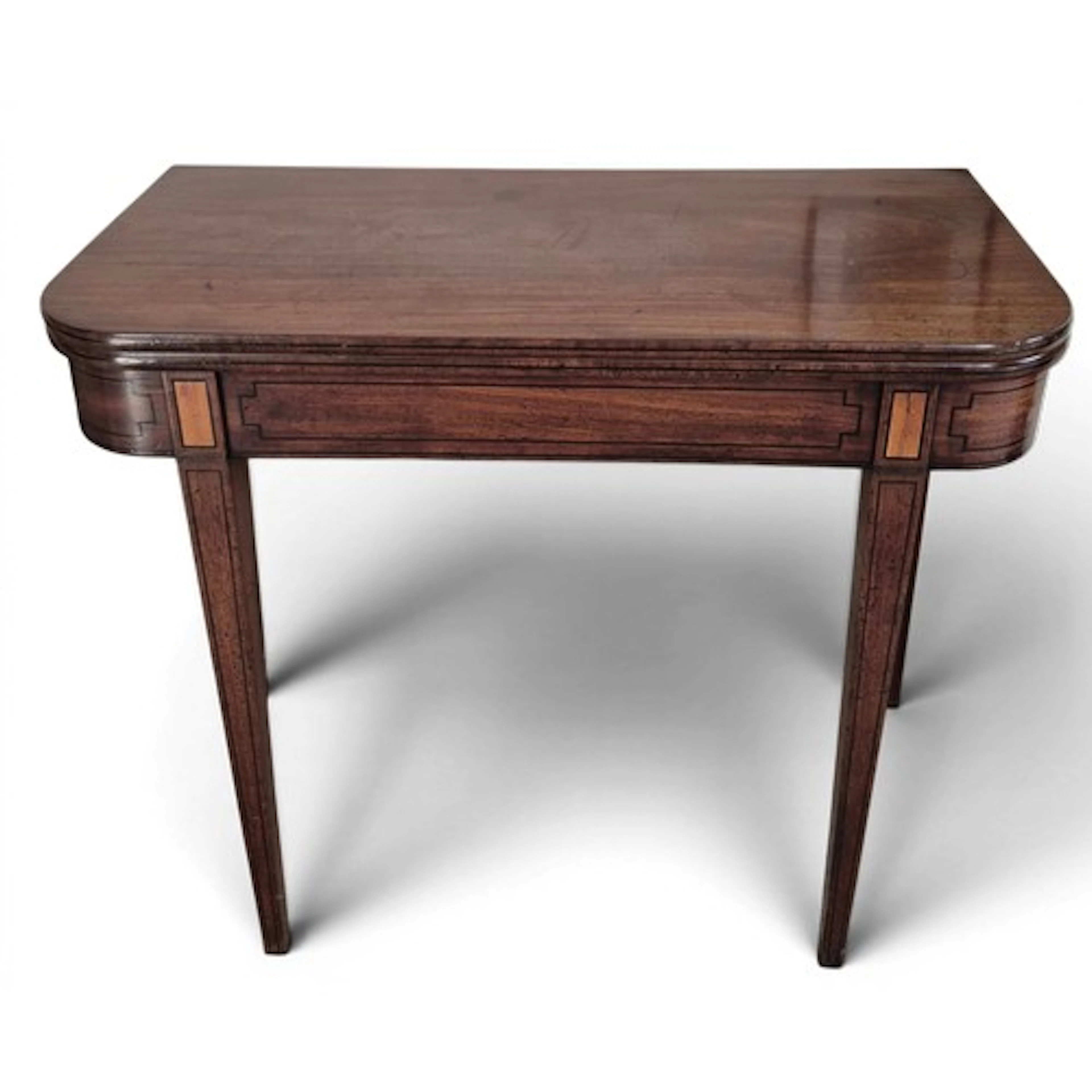 A 19thC mahogany fold over tea table. ...