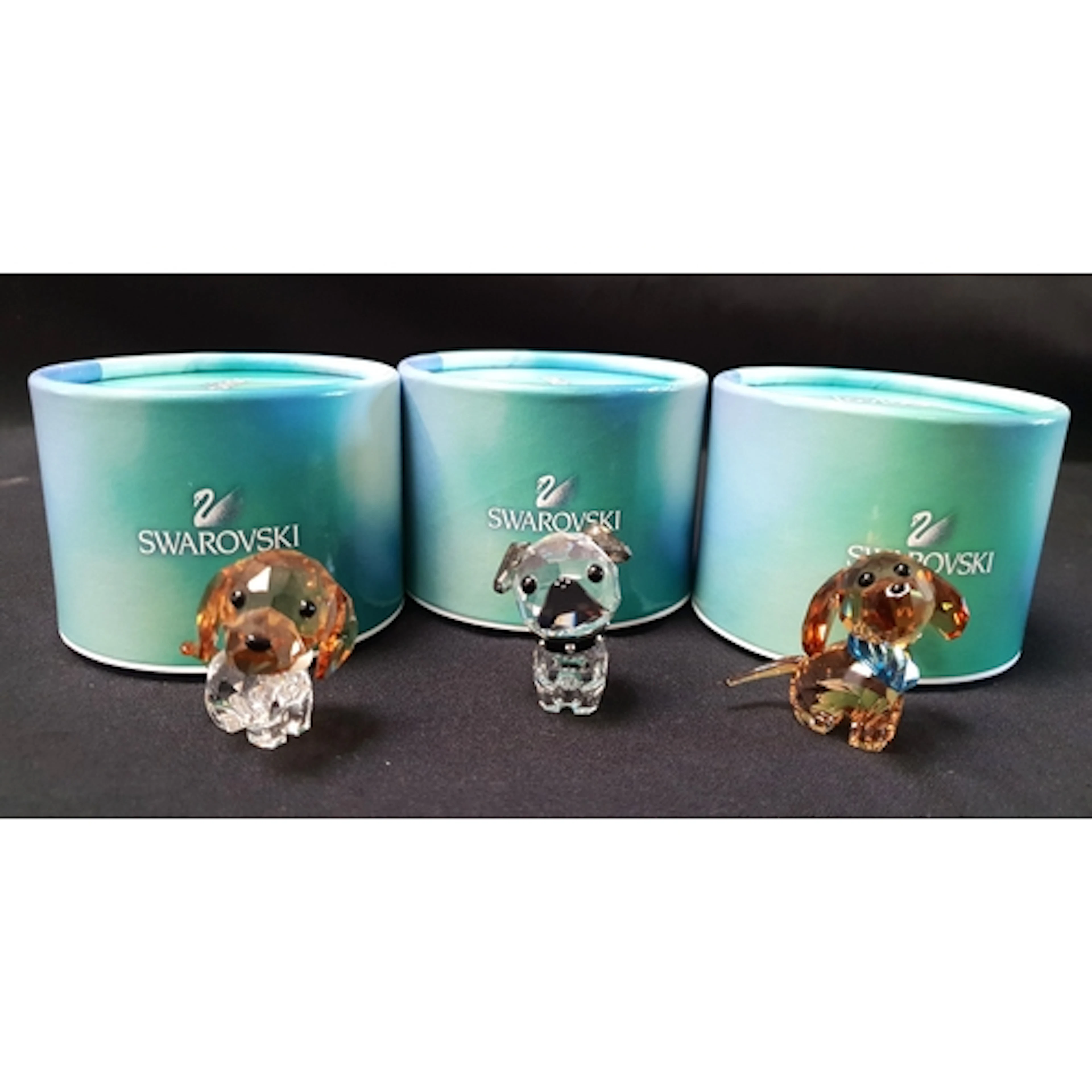 THREE SWAROVSKI PUPPY DOG FIGURINES comprising 'Lovlots Pupp...