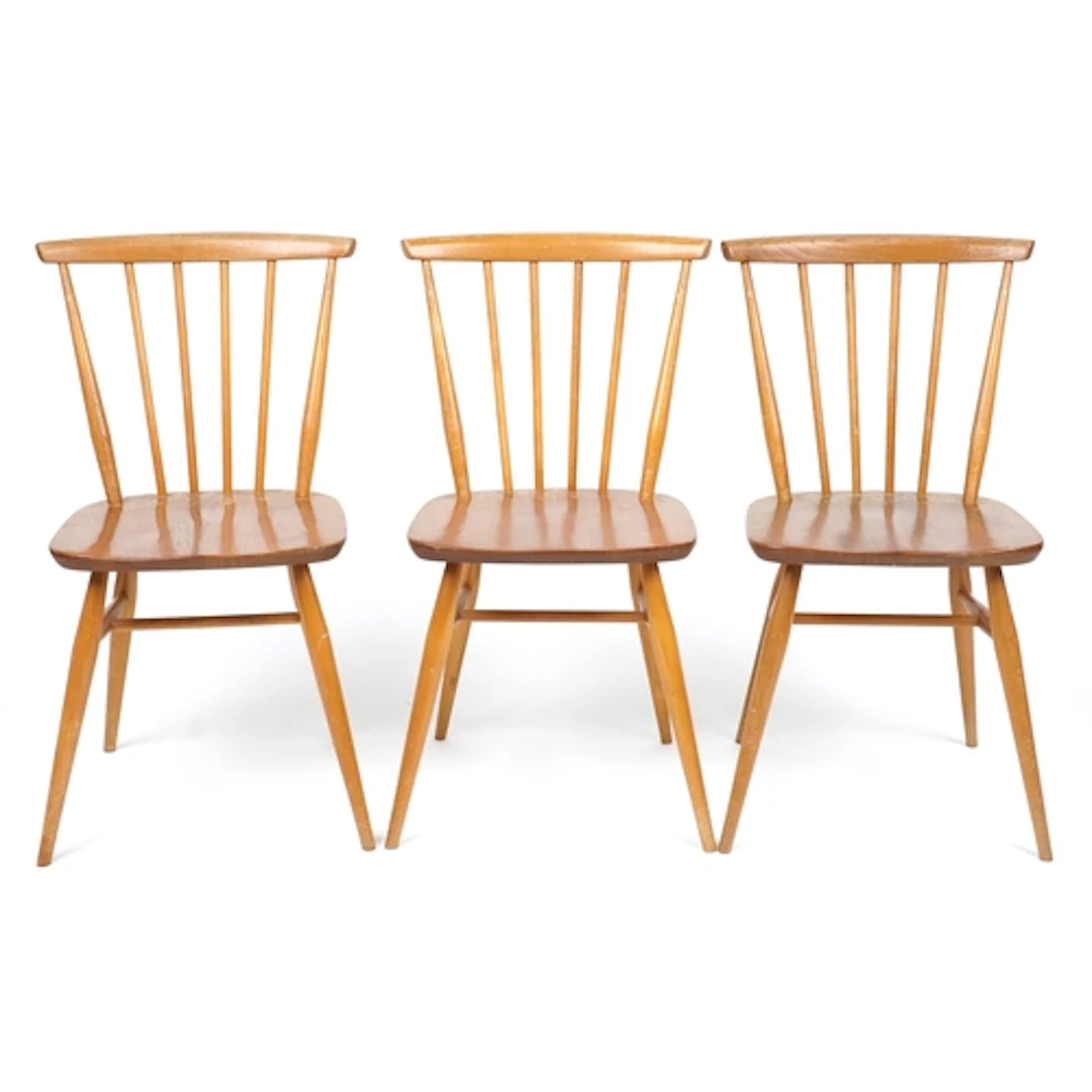 Three Ercol Windsor style spindle back chairs, each 80cm hig...