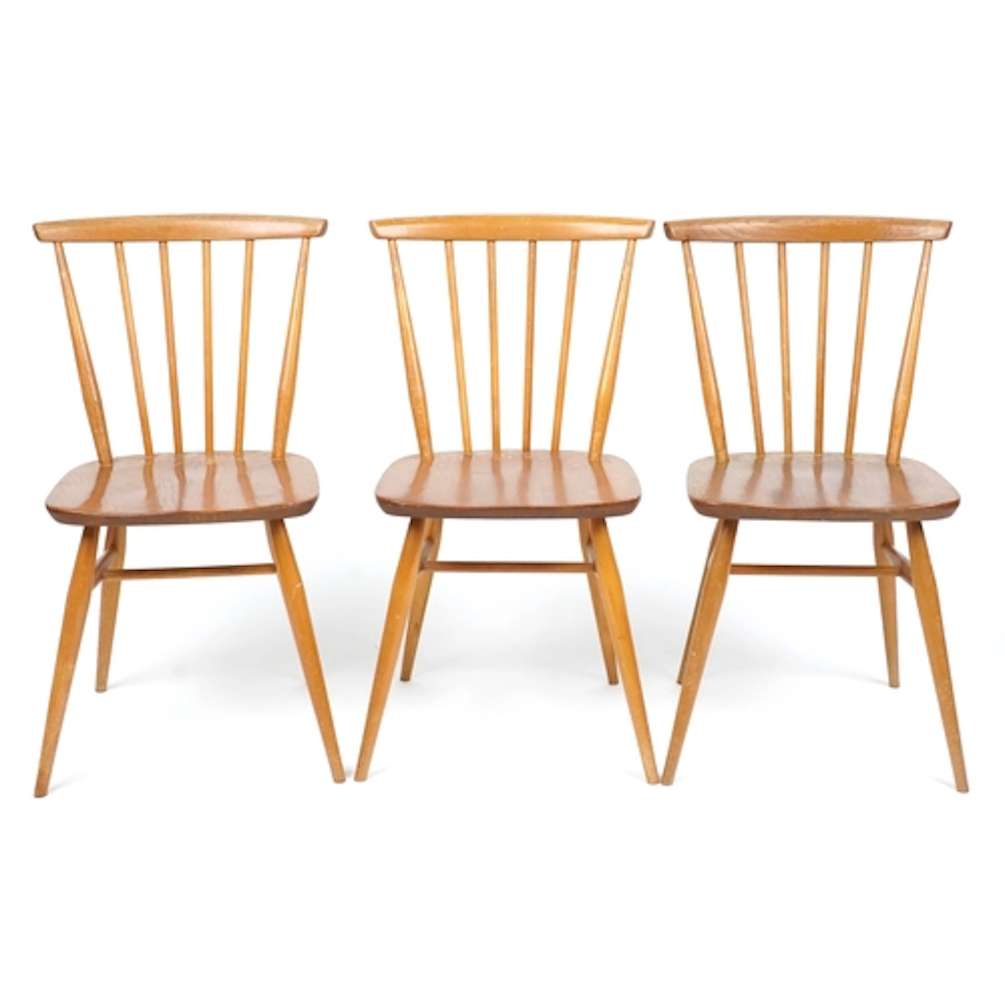Three Ercol Windsor style spindle back chairs, each 80cm hig...