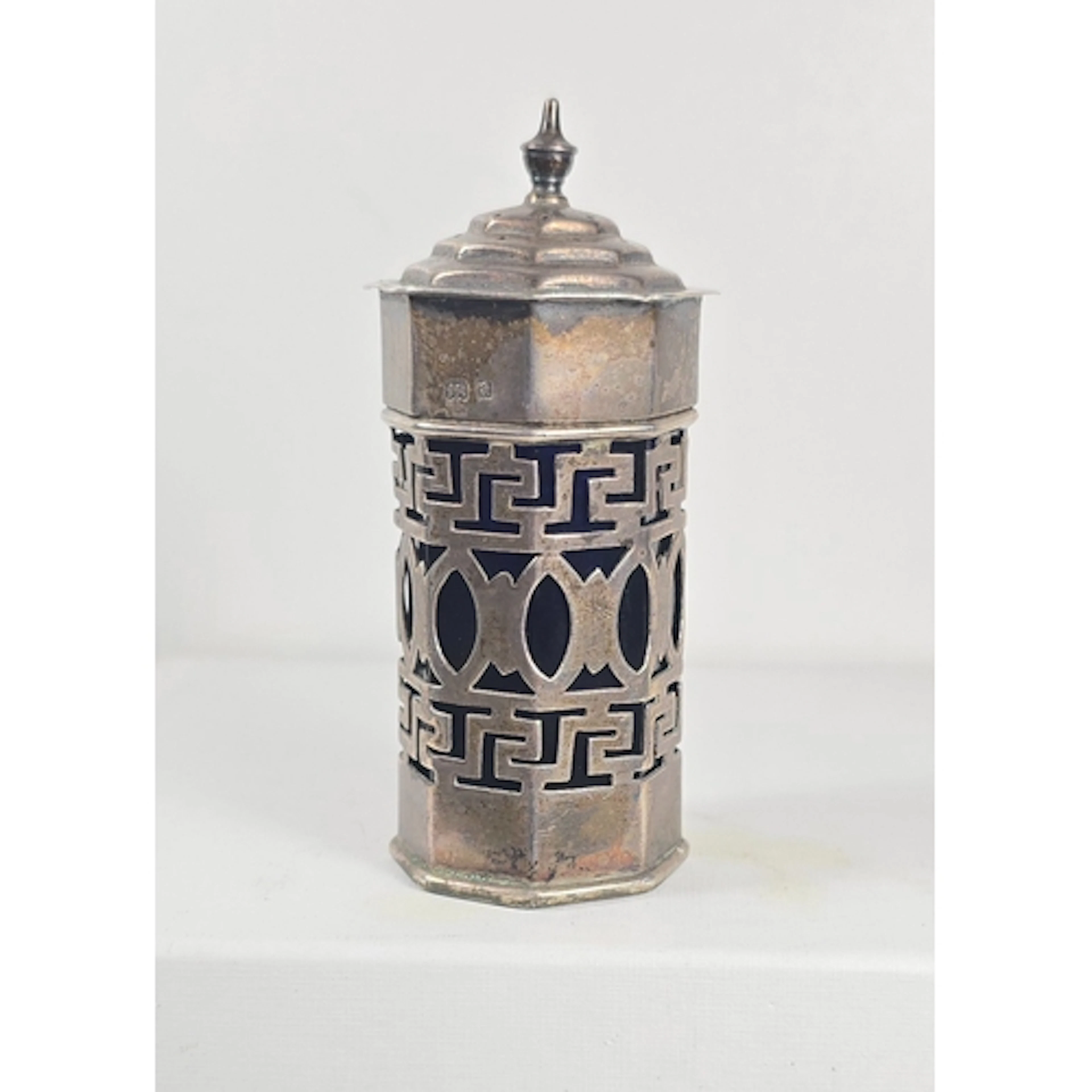 A small quantity of silver items including sugar sifter HM L...