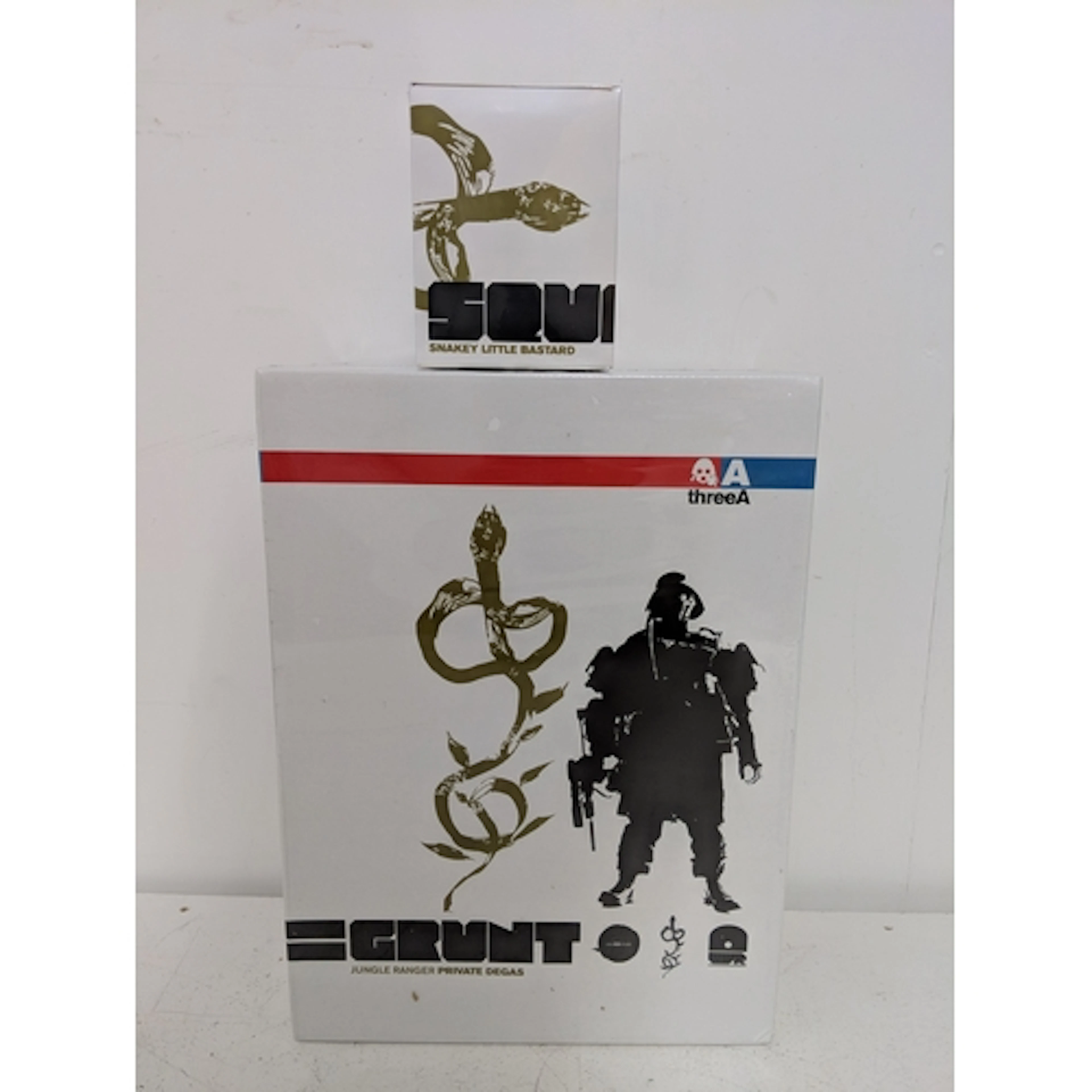 A threeA unopened Grunt Jungle Ranger Private Degas with an ...