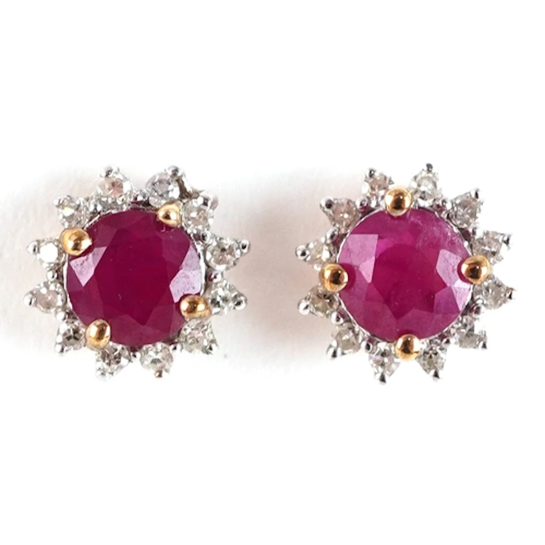 Pair of 9ct gold ruby and diamond solitaire stud earrings, 6...