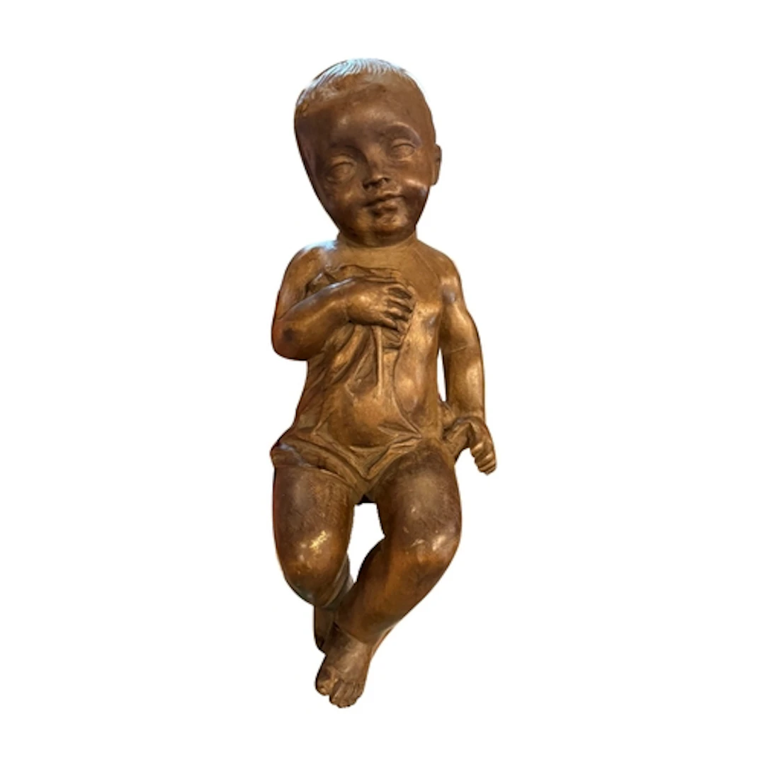 A carved hardwood figure of the Infant Christ, from a Nativi...