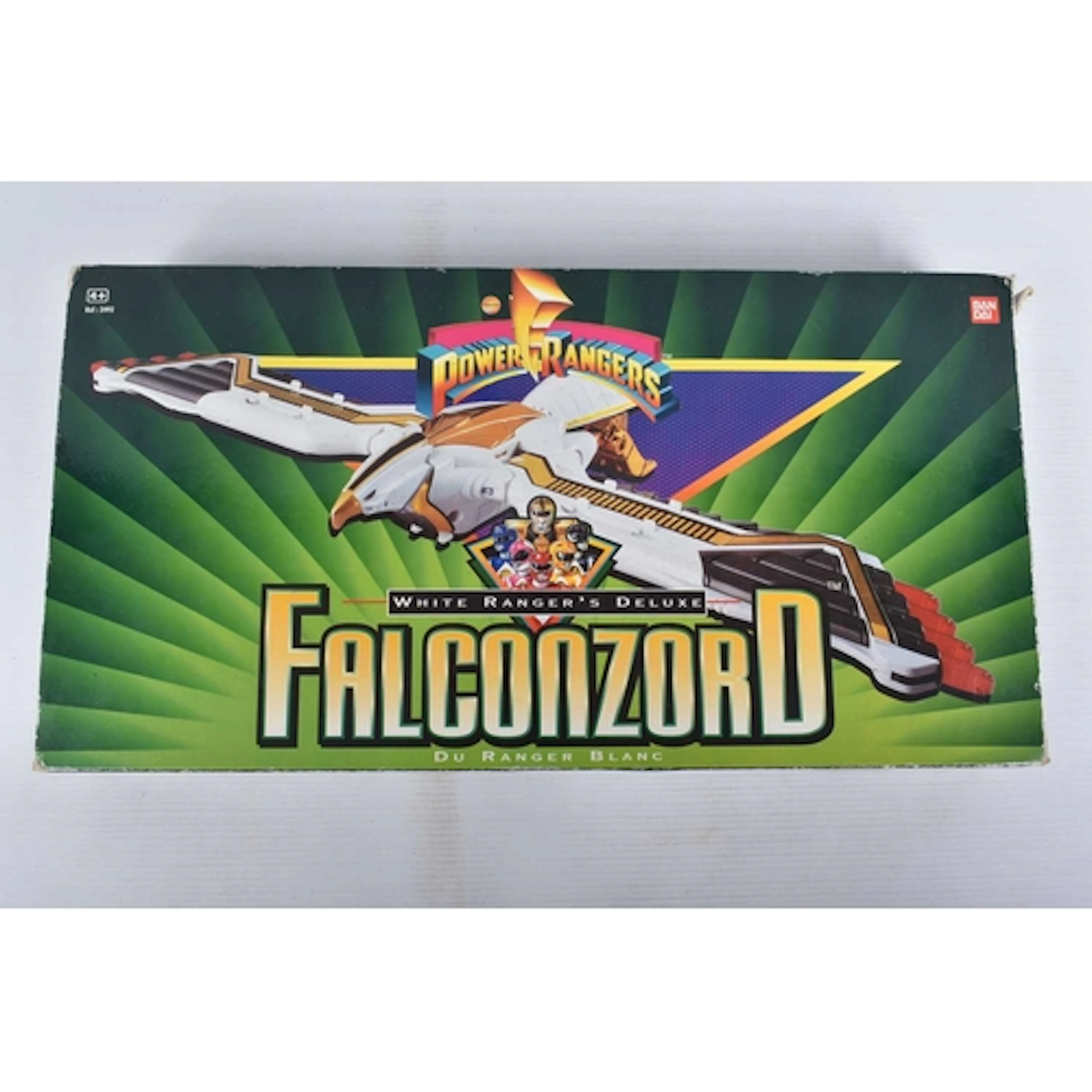 A BOXED BANDAI WHITE RANGERS DELUXE FALCONZORD, comprising a...