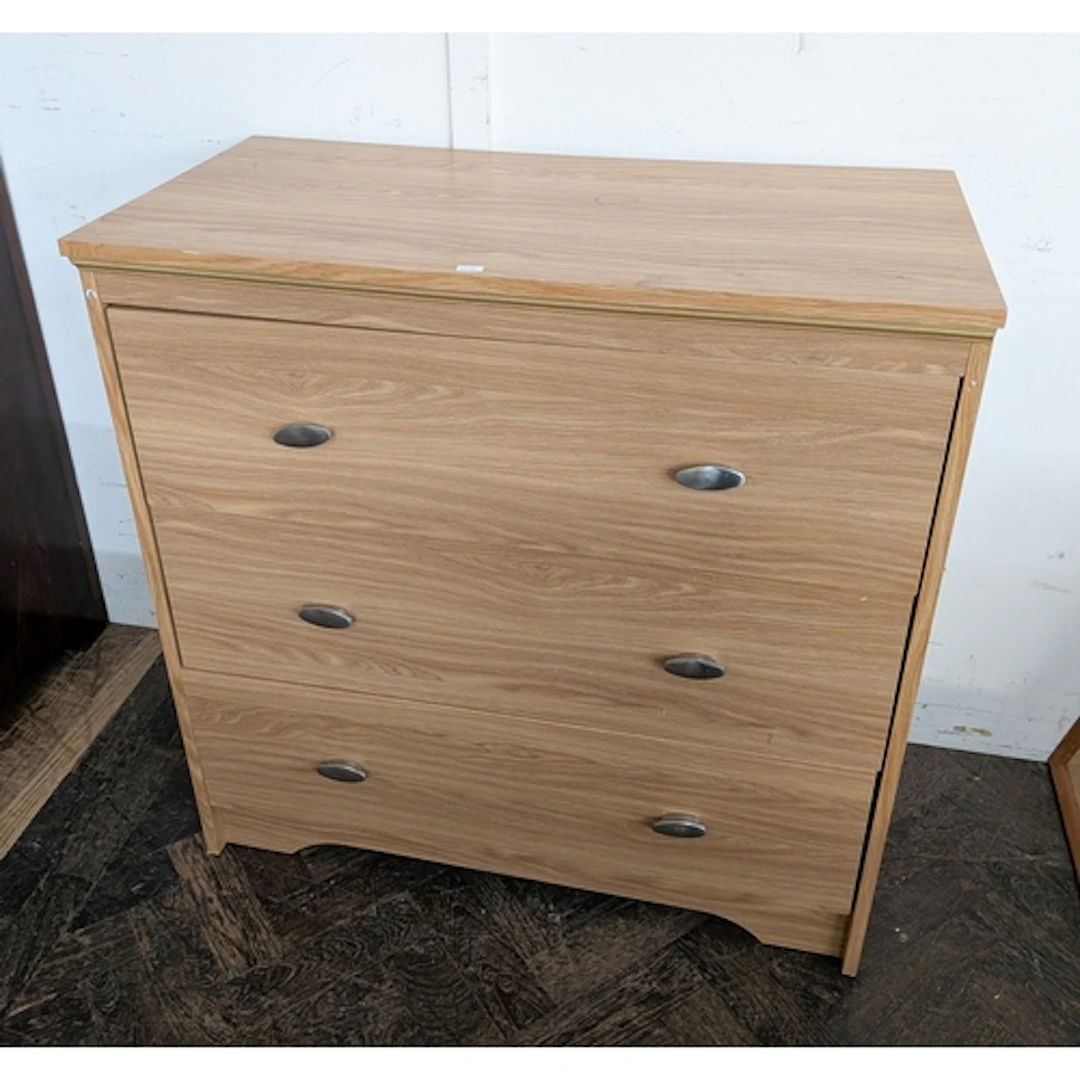 Modern pale teak finished chest of three long drawers