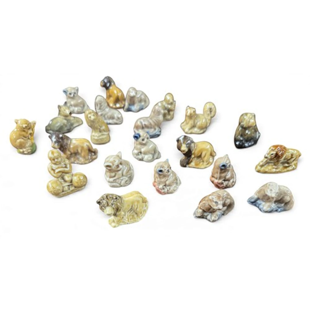 A collection of twenty-two Wade Whimsies dating from the 196...