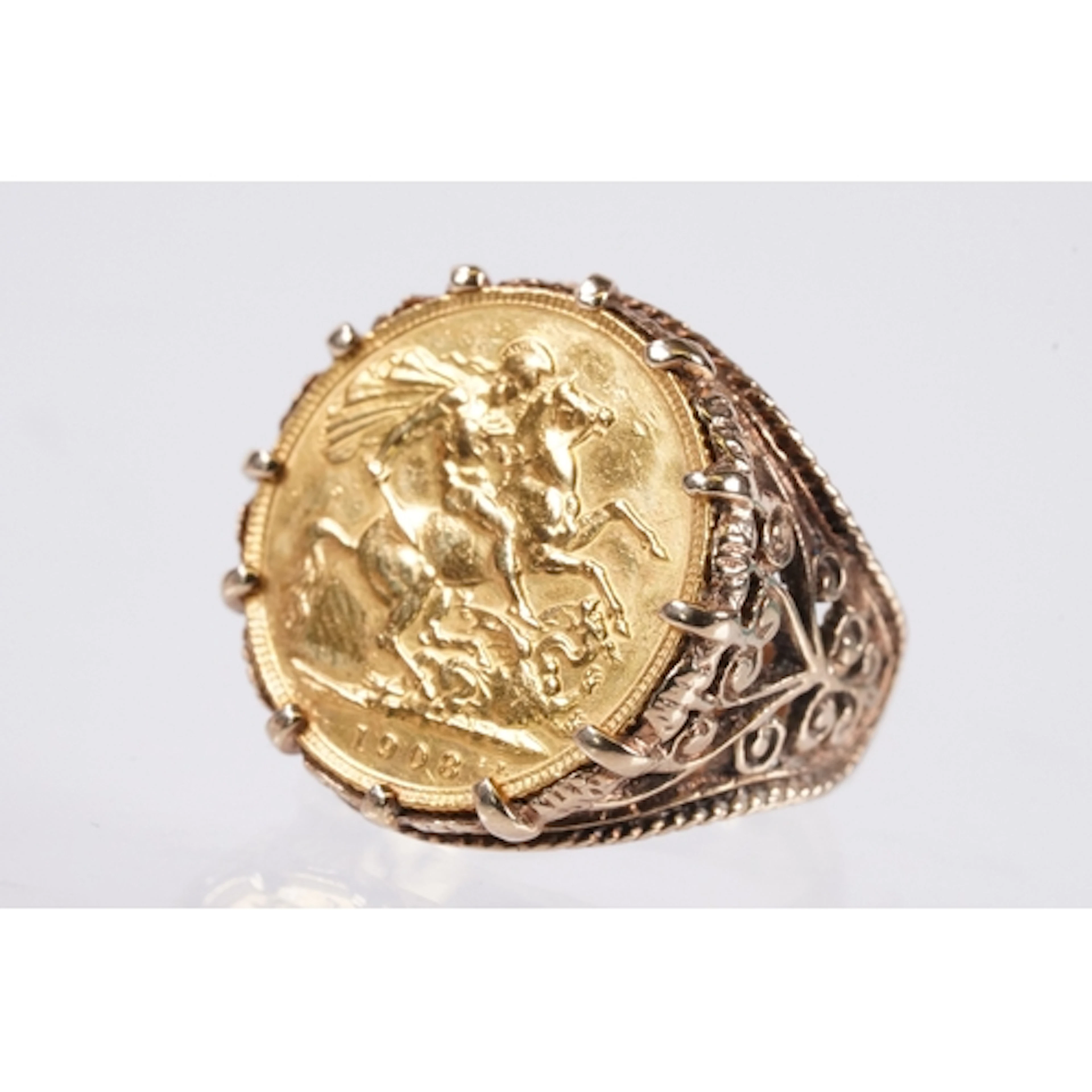 9ct gold ring set with an 1908 full sovereign coin. The ring...