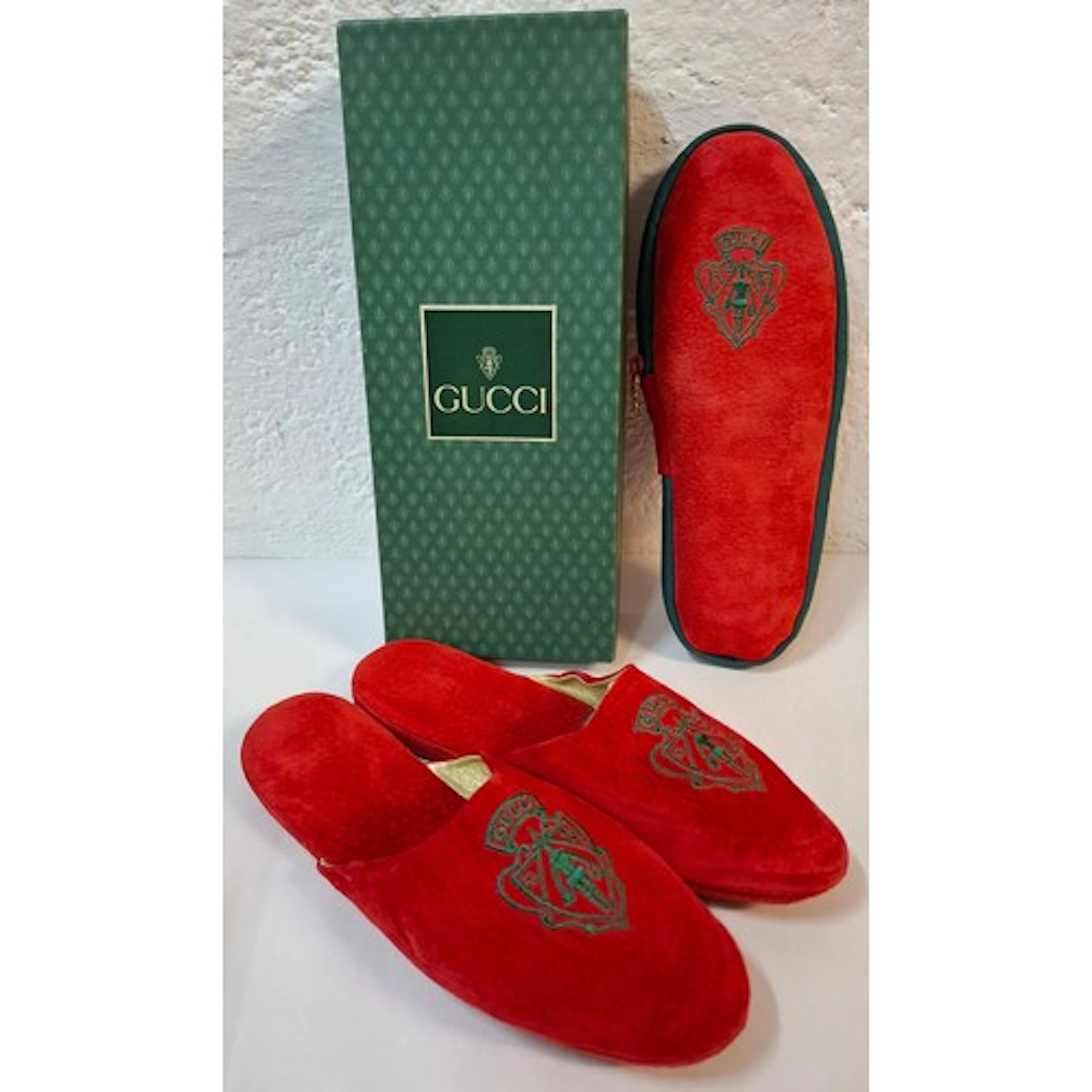 Gucci - A pair of late 20th century red slippers size 37 (on...