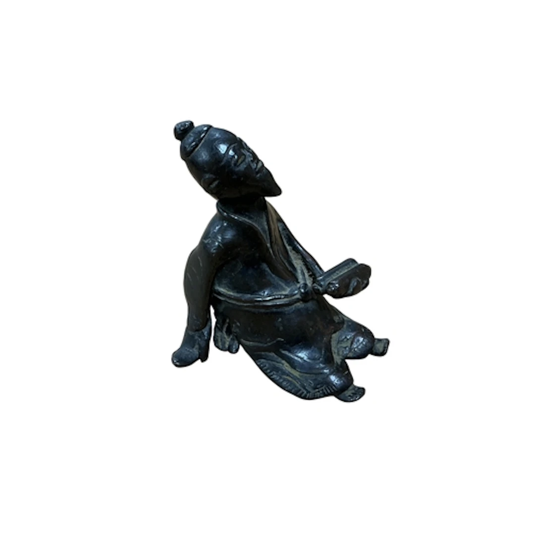 A small Chinese bronze of a scholar, Ming, 7cm high