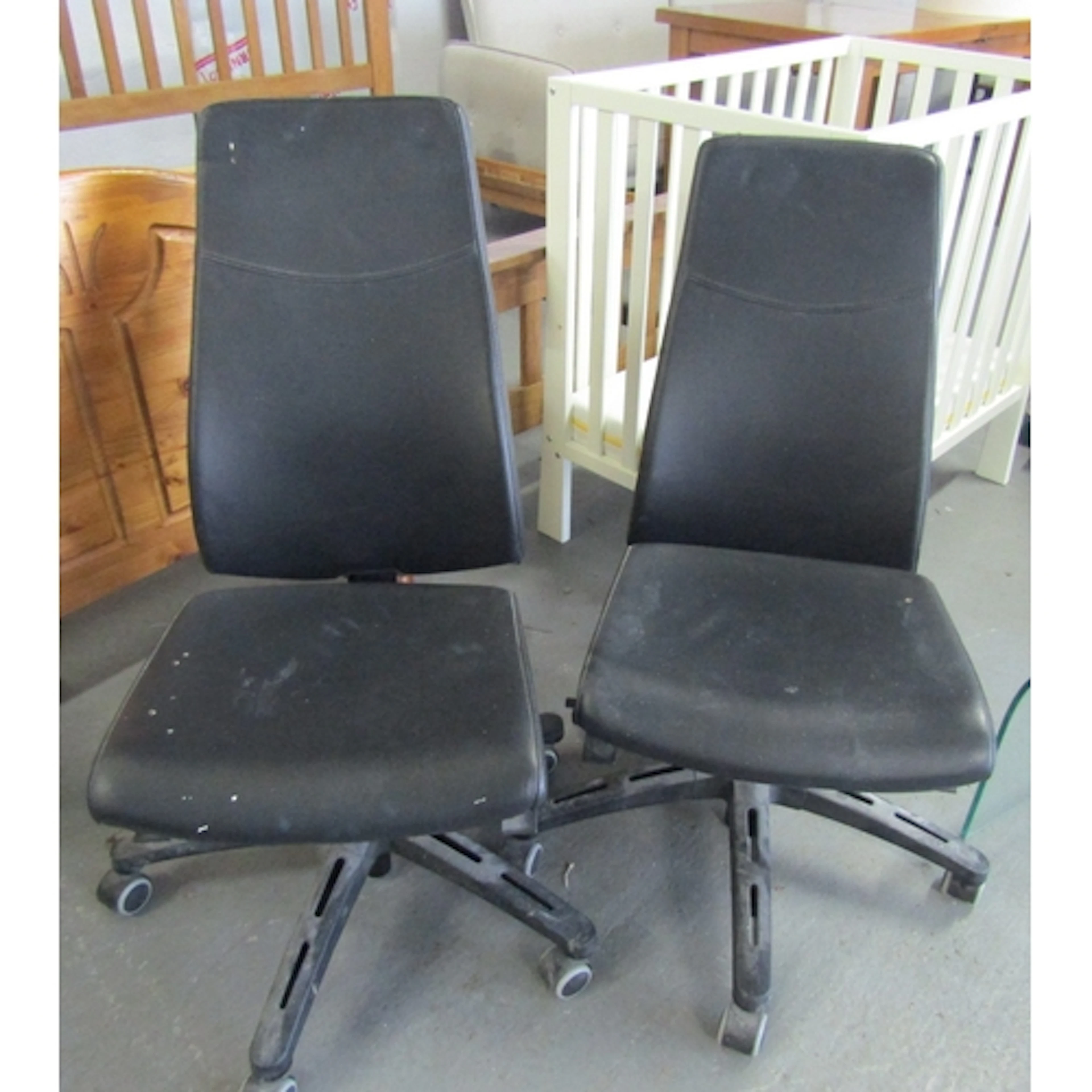 Pair of Leather Upholstered Swivel Base Office Chairs
