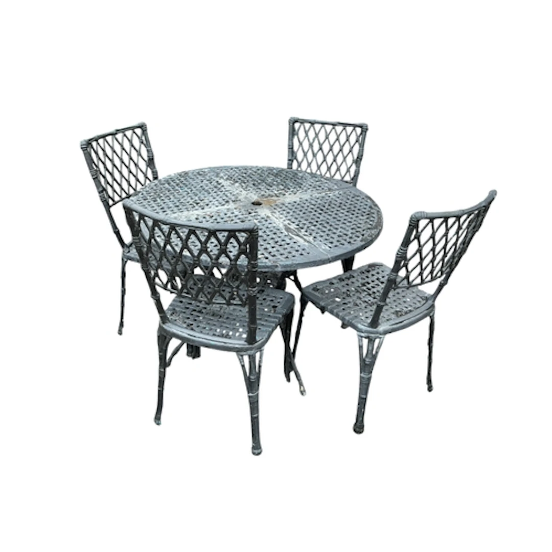 A circular table and four lattice back chairs, table diamete...