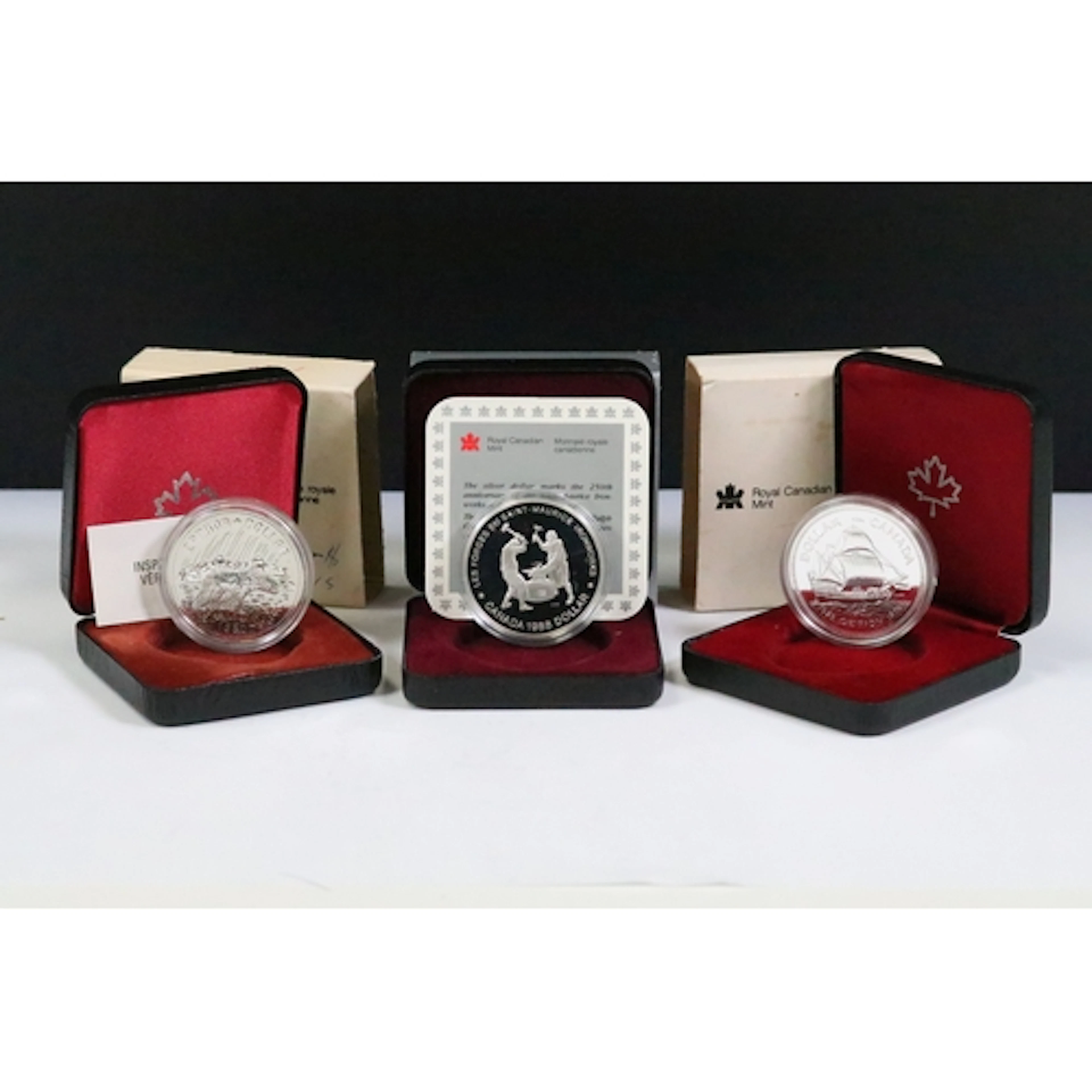 A collection of three Royal Canadian Mint silver proof comme...