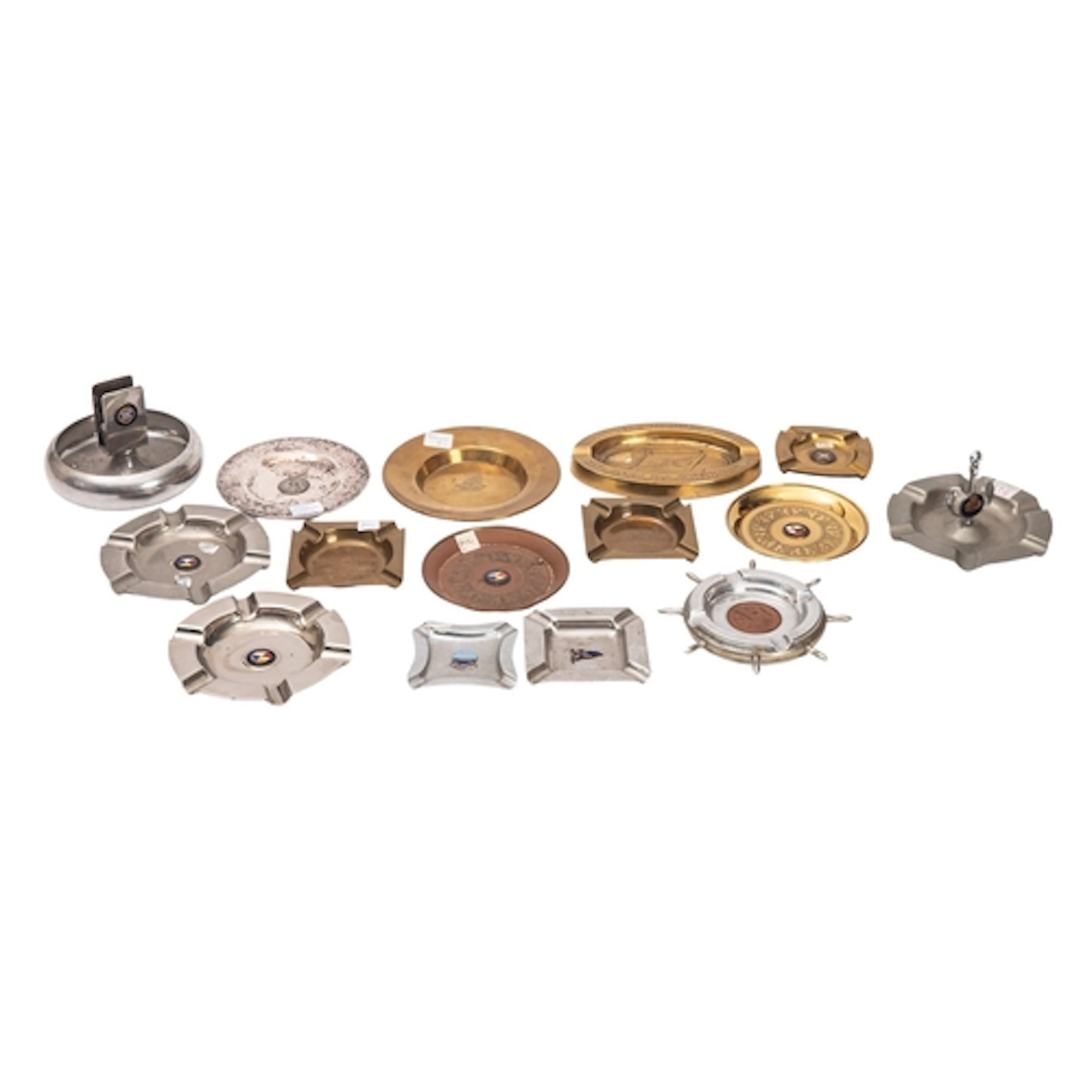 A collection of a shipping line metalware ashtrays, includin...